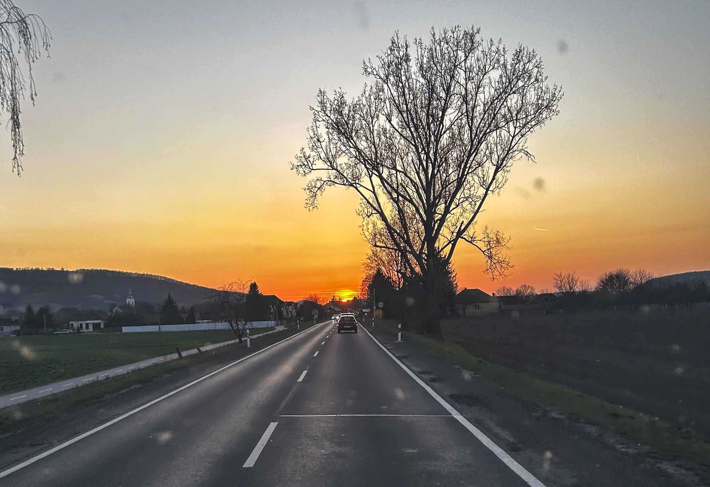 Sunset through car windshield