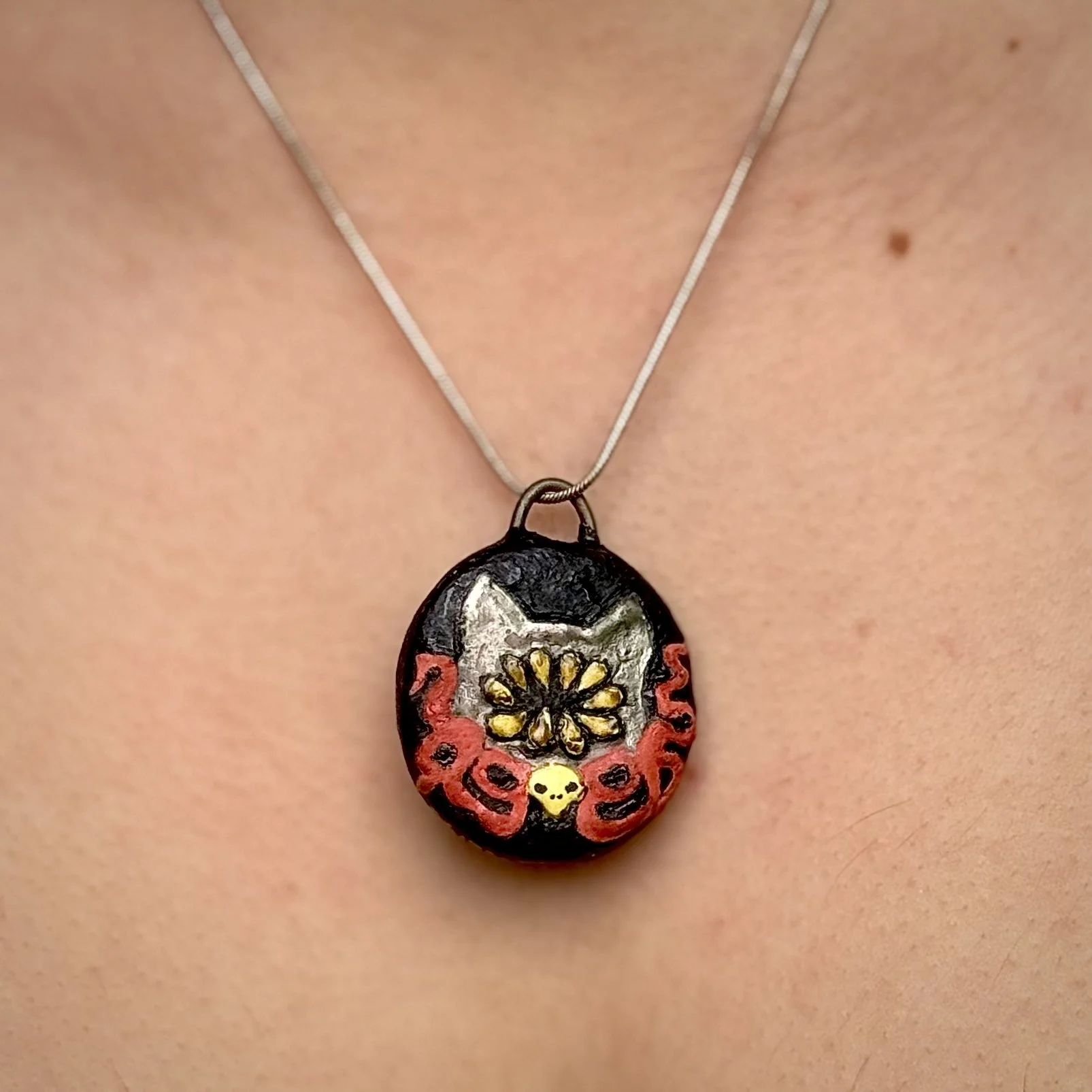 "Dull Your Teeth" Pendant