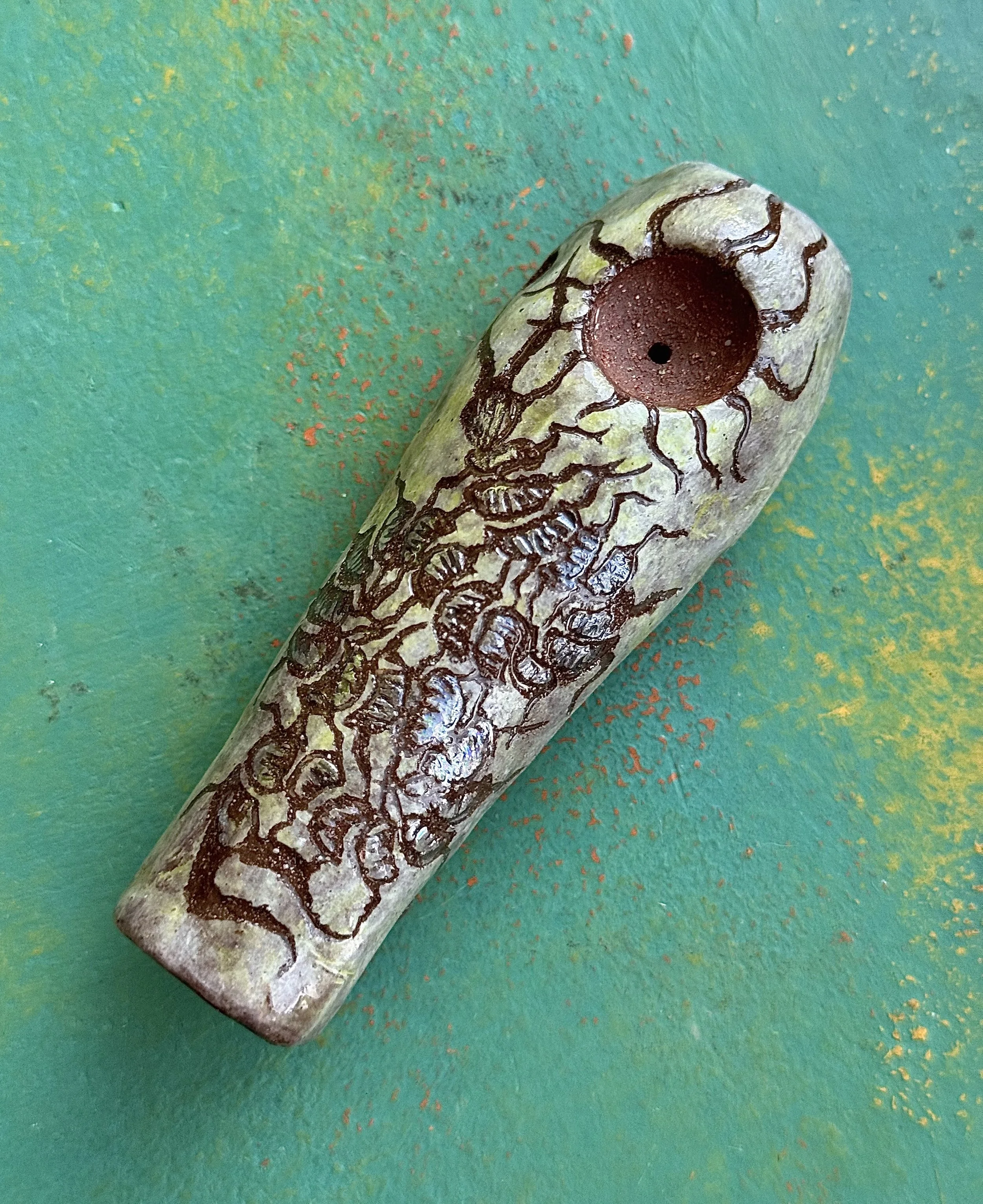 "CHILOPODA", red earth ceramic pipe, velvet underglaze, mother of pearl lustre
