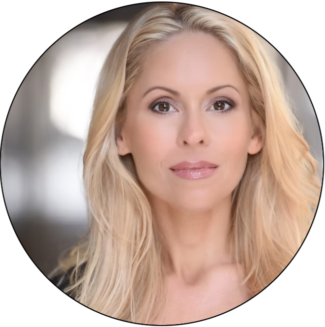 A portrait of a smiling blonde woman with long wavy hair, natural makeup, and a blurred background. Jenni Ross Kula for Karma