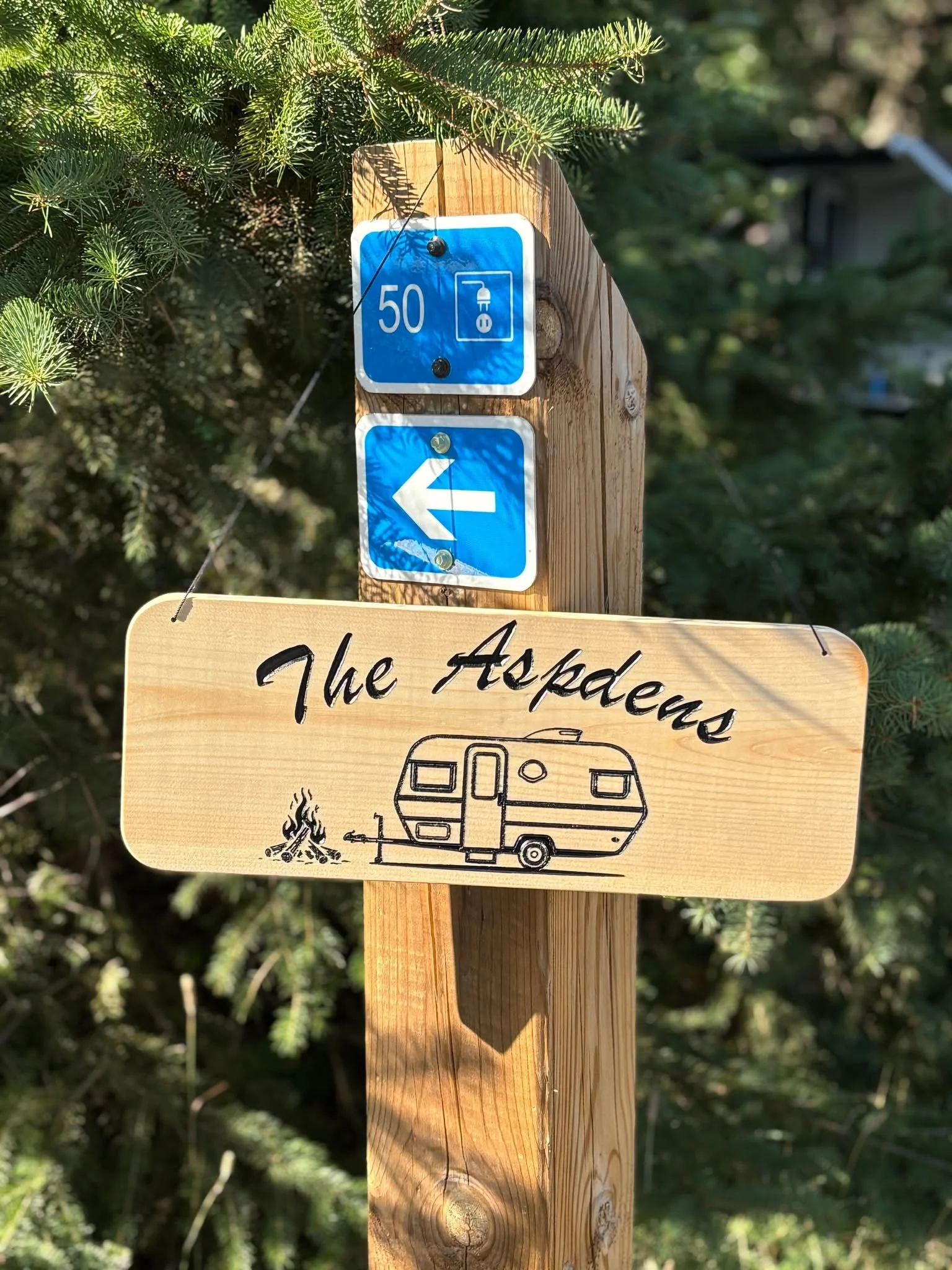 Simple engraved and painted camp sign