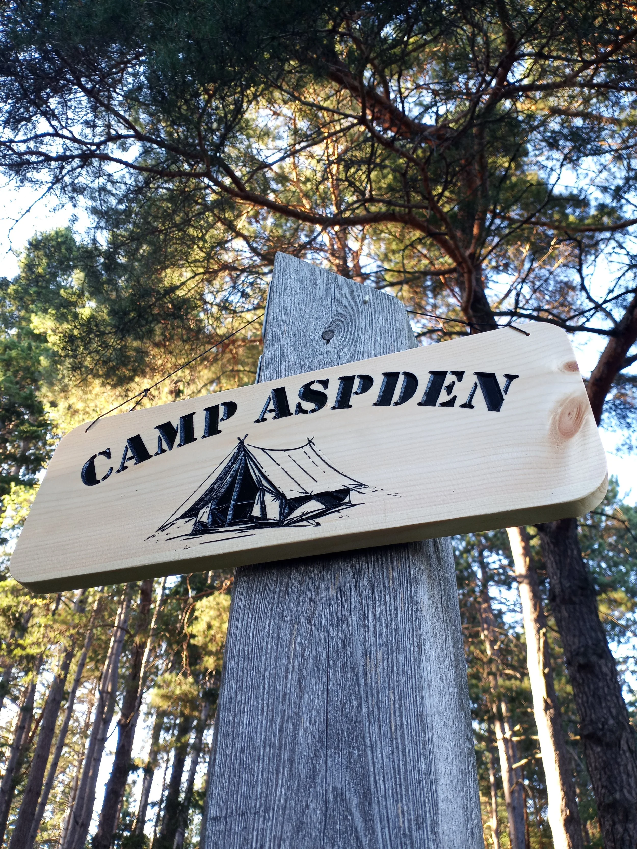 Simple engraved and painted camp sign.
