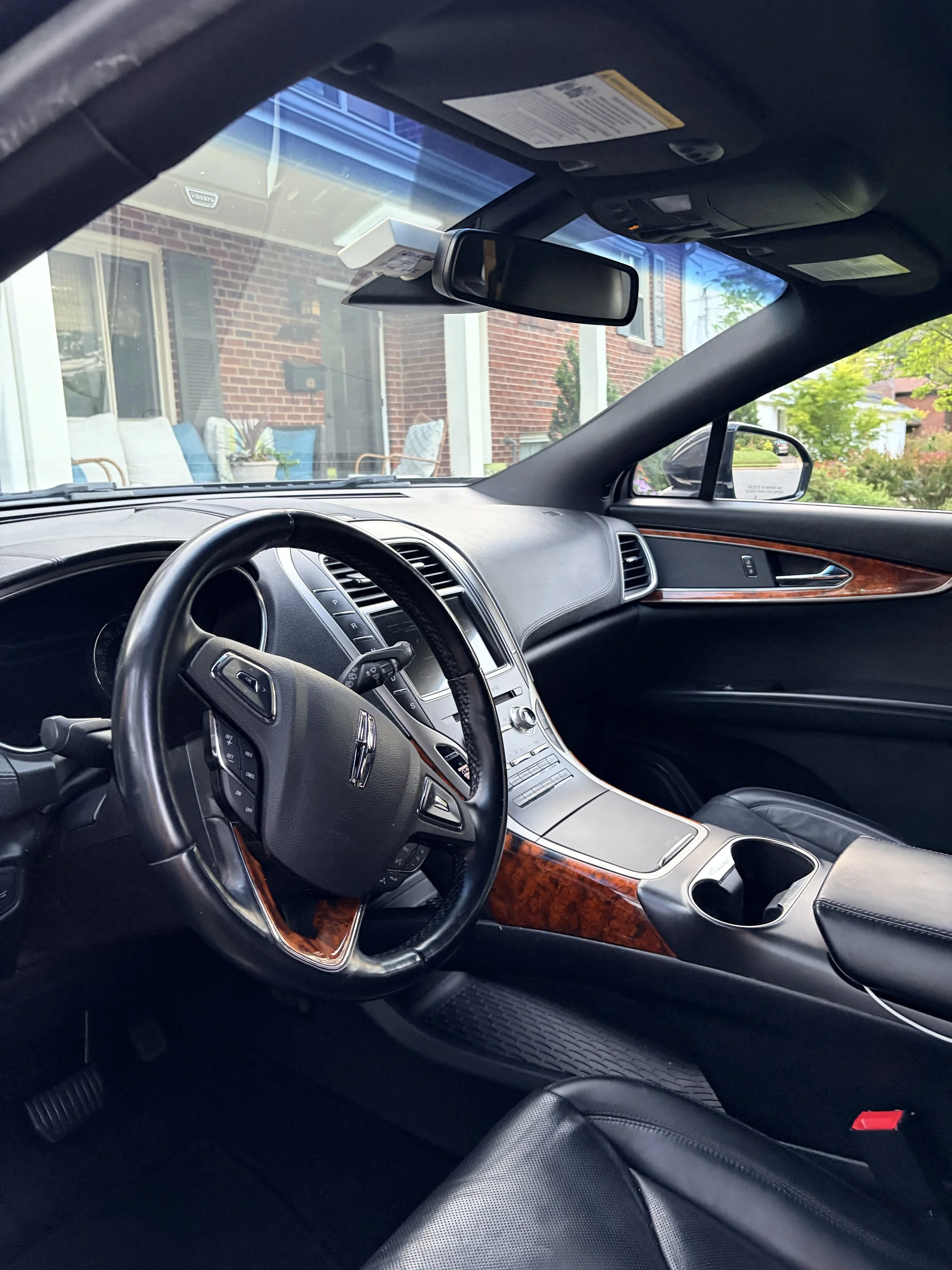 Interior vacuuming during a mobile car detail