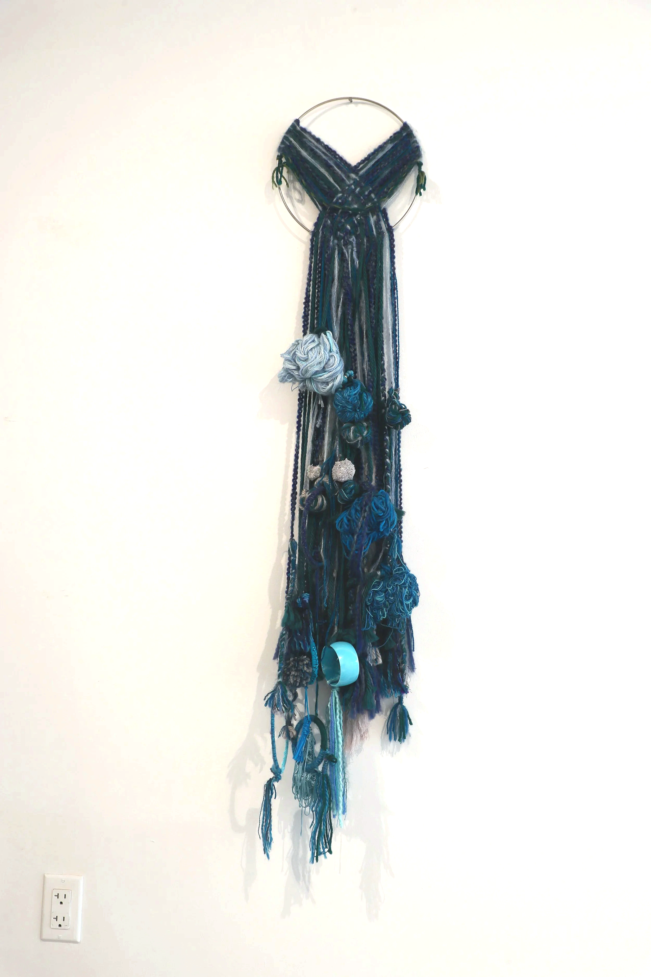 Ocean Breeze, 2023 by Portia Bowers | Fiber, jewelry, metal | 51” L x 5.5” W x 5” D
