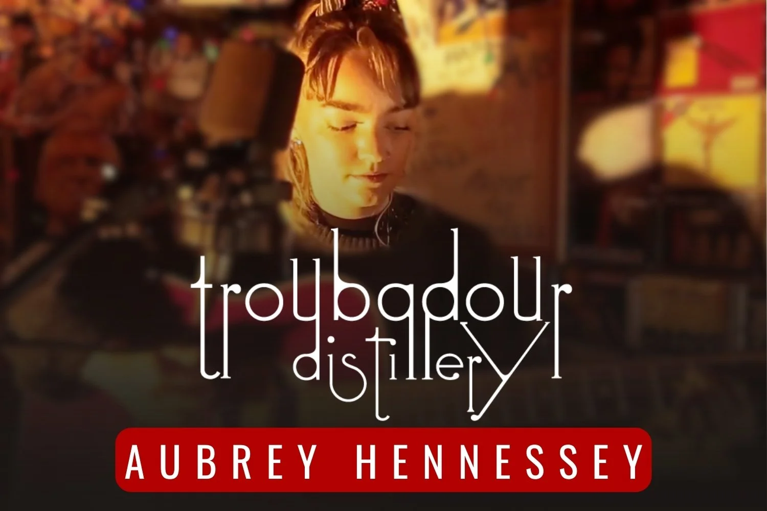       
  
    Aubrey Hennessey’s fingerpicking is calm and controlled. Her voice, however, isn’t as easy to explain.  It certainly has an Irish flair — it trembles in the more emotive heights of the song, before suddenly flipping into a soothing, Eas