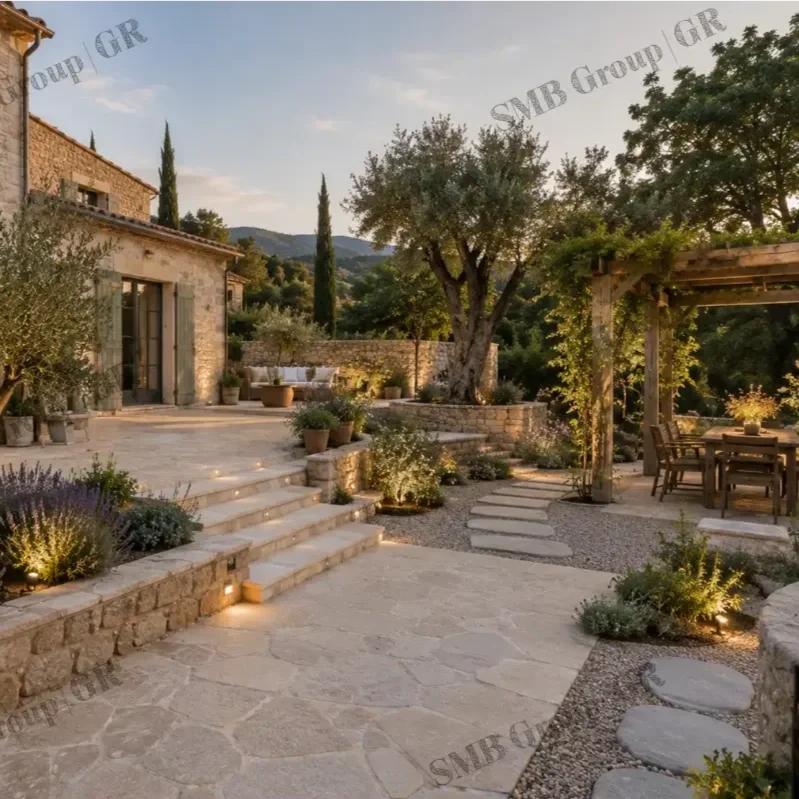 A picturesque outdoor patio with stone steps, potted plants, a large olive tree, and a wooden pergola, illuminated by outdoor lighting at sunset.