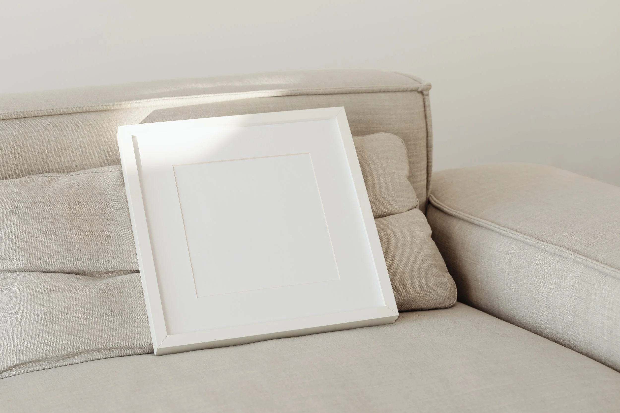 kaboompics_square-white-picture-frame-27066 (1).jpg