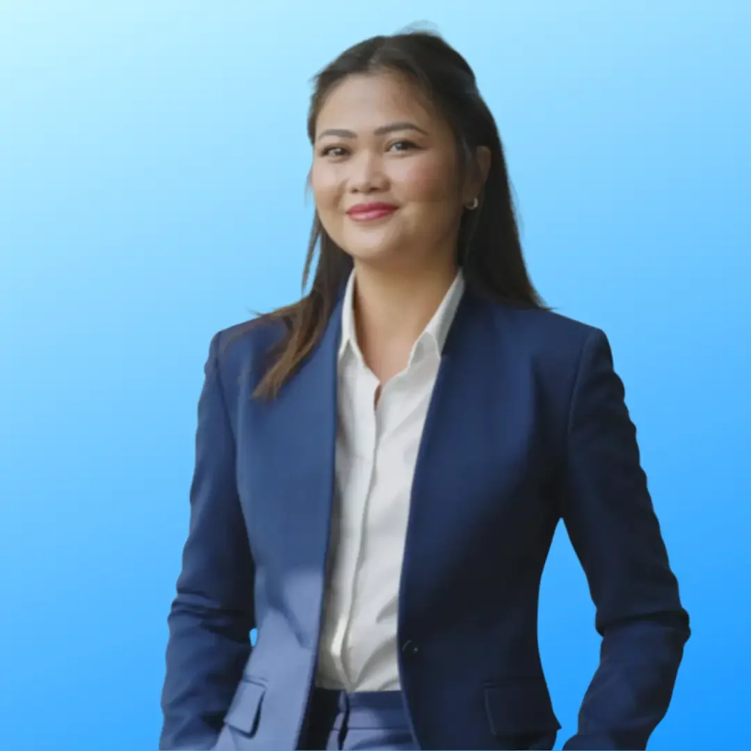 rhiz paredes headshot on blue background. 