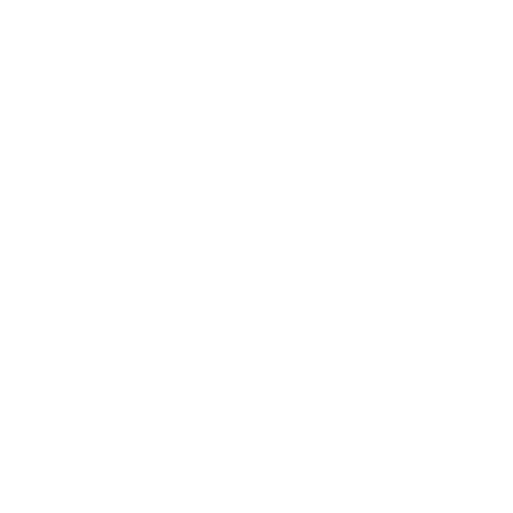 Icon of a person with headphones working on a laptop, with a gear symbol in front, representing technical support or IT assistance.
