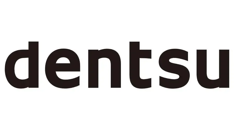 The word "dentsu" written in lowercase black letters on a white background.