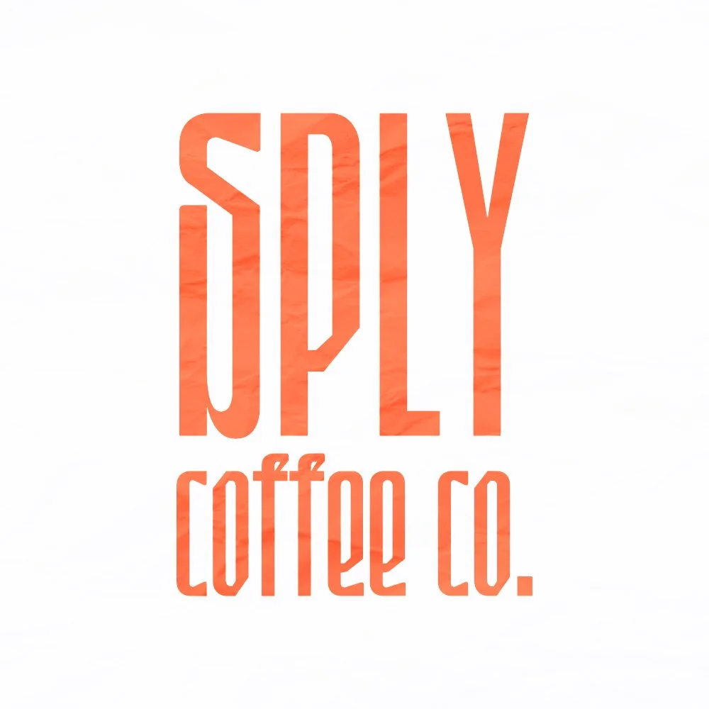 Text in large orange letters reads "SOY" with smaller orange text below saying "coffee co." on a white background.