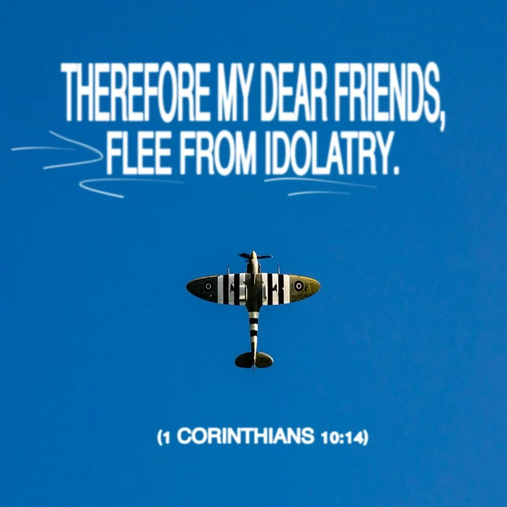 A vintage military aircraft flying in a clear blue sky with a quotation from 1 Corinthians 10:14, "Therefore my dear friends, flee from idolatry," written in white text at the top of the image.