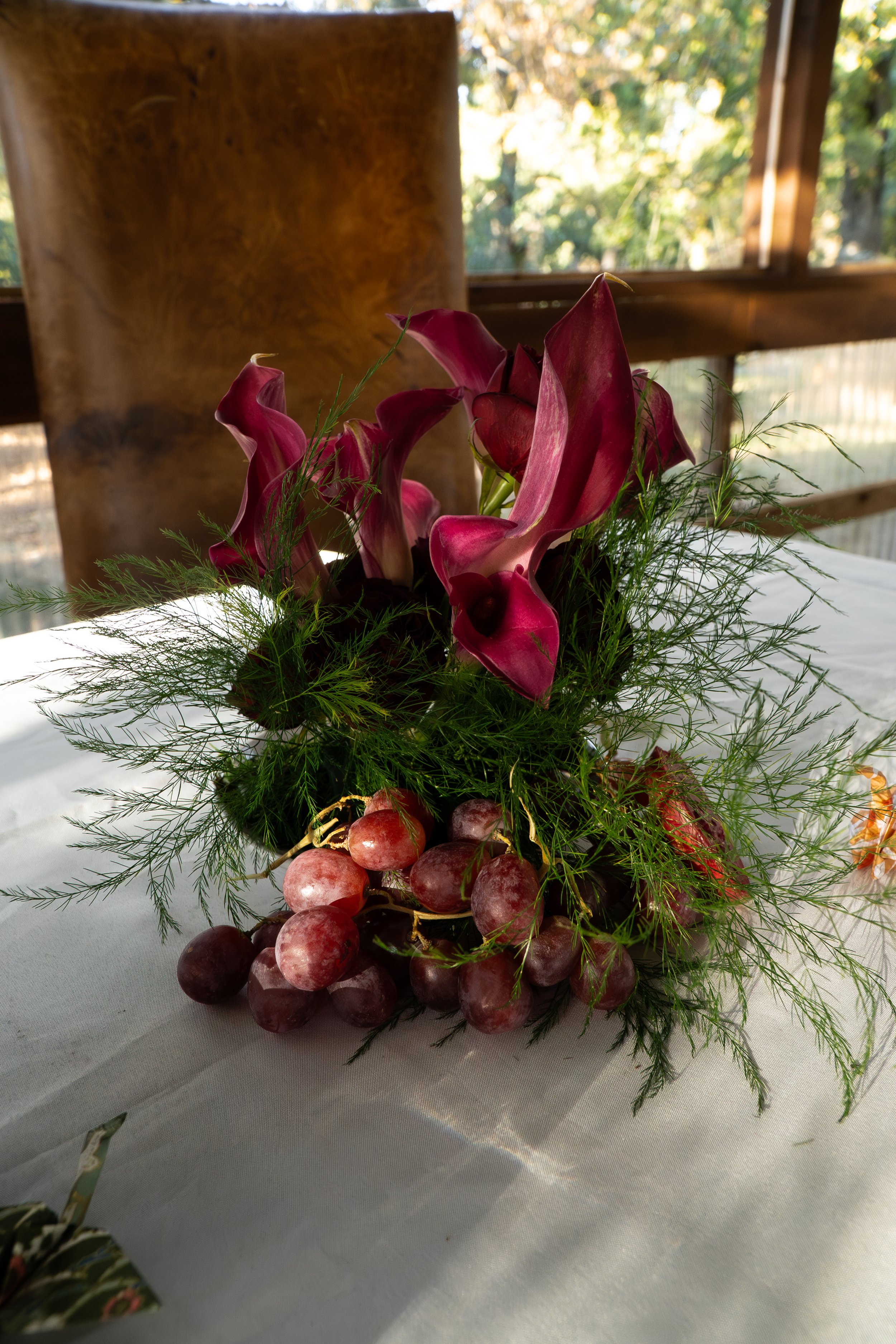 lilies, white tablecloth, pink flowers, centerpiece, affordable centerpiece, plano decorator, argyle decoratot