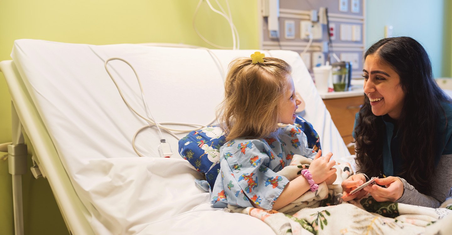 patient-and-nurse-smiling-and-talking-1440x748.jpg