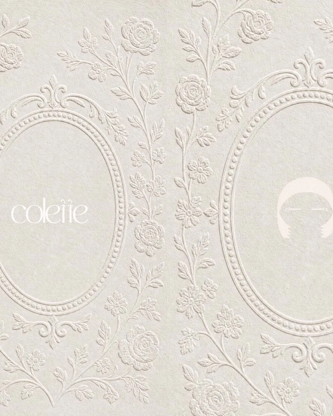 Embossed floral pattern with oval mirror frames and the word 'coletie' on textured white wallpaper.