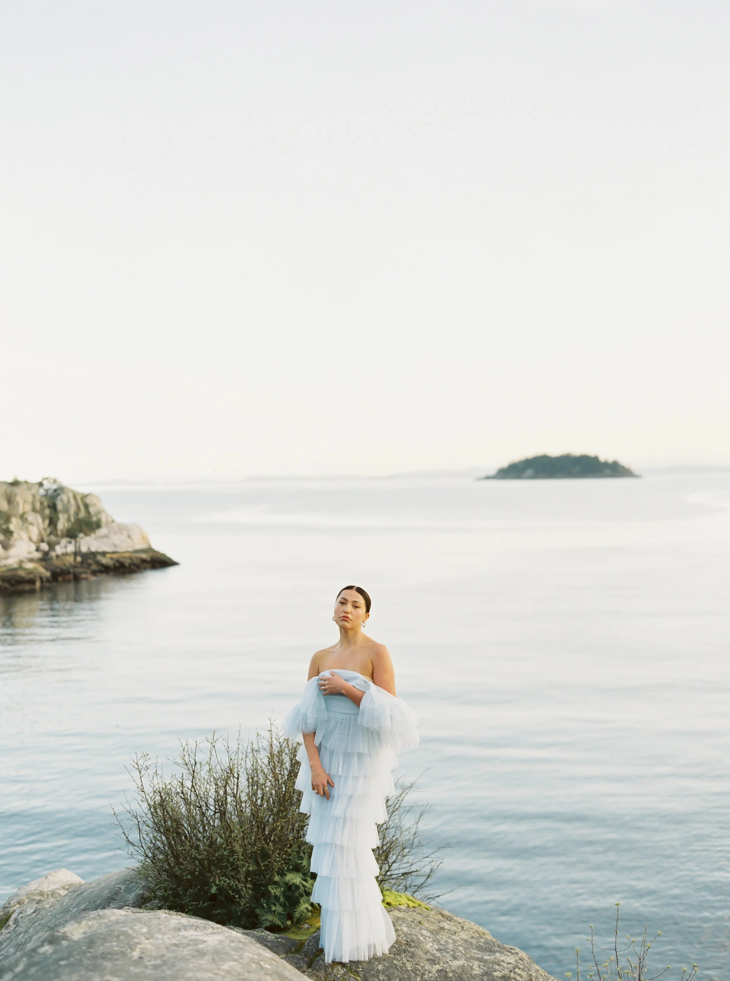 Bridal editorial set in nature featuring romantic wedding gowns by Vancouver Designer Ouma.
