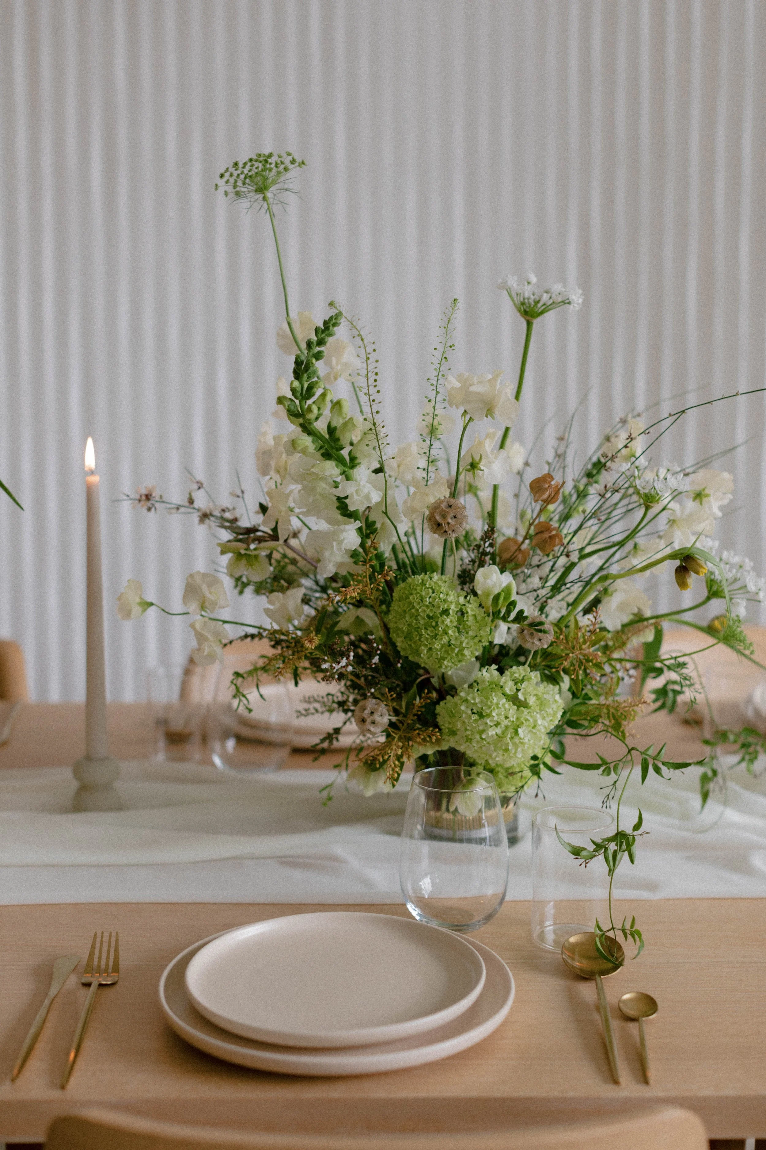Earthy tablescape featuring natural, textural florals by Neve Floral, organic-inspired rentals by Camilia Supply.