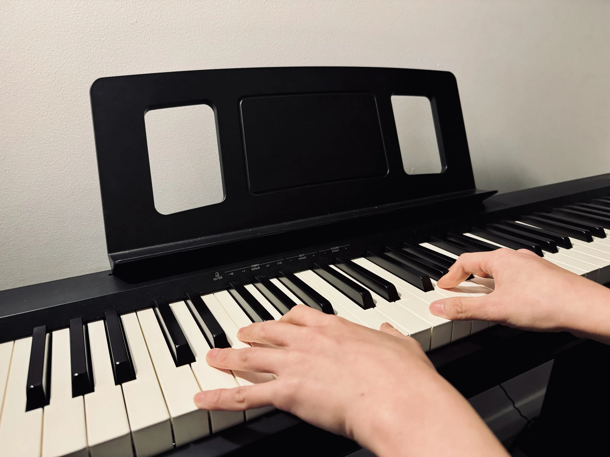 Piano and hand.jpeg