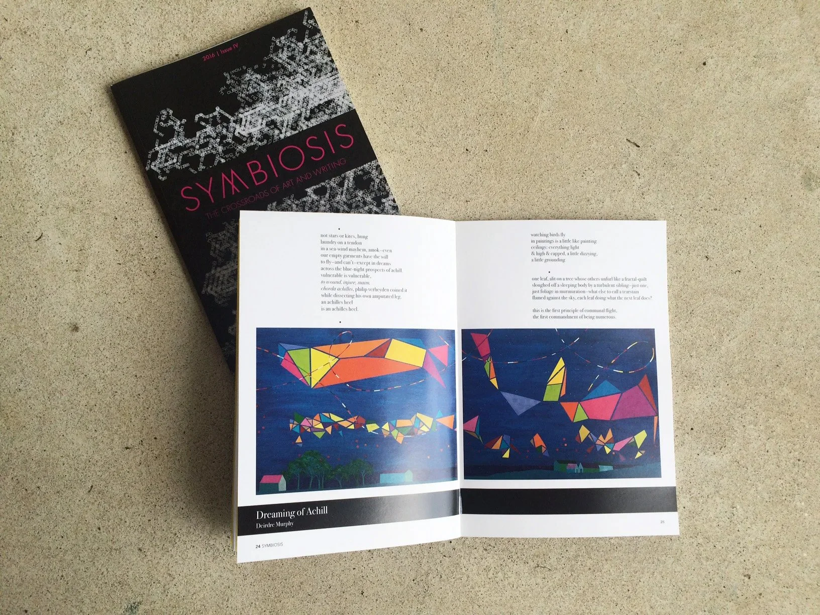 Open magazine displaying colorful abstract geometric art titled "Dreaming of Achill" by Deirdre Murphy, with text in an accessible layout.