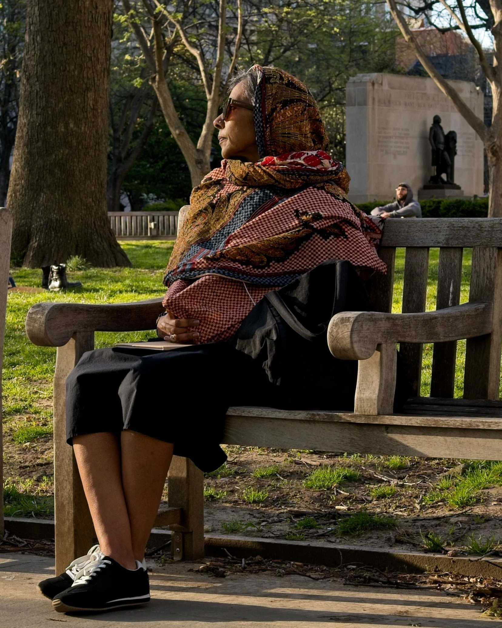 women sitting washington square park philadelphia.jpg