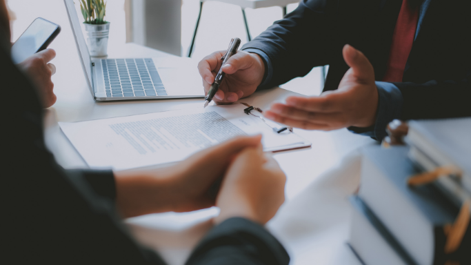 A meeting or negotiation between employee and employer