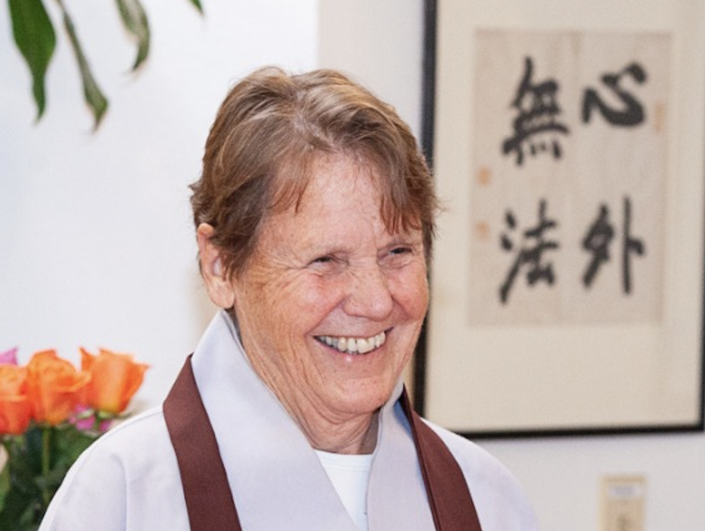 Zen Master Soeng Hyang smiles, looking off to the right