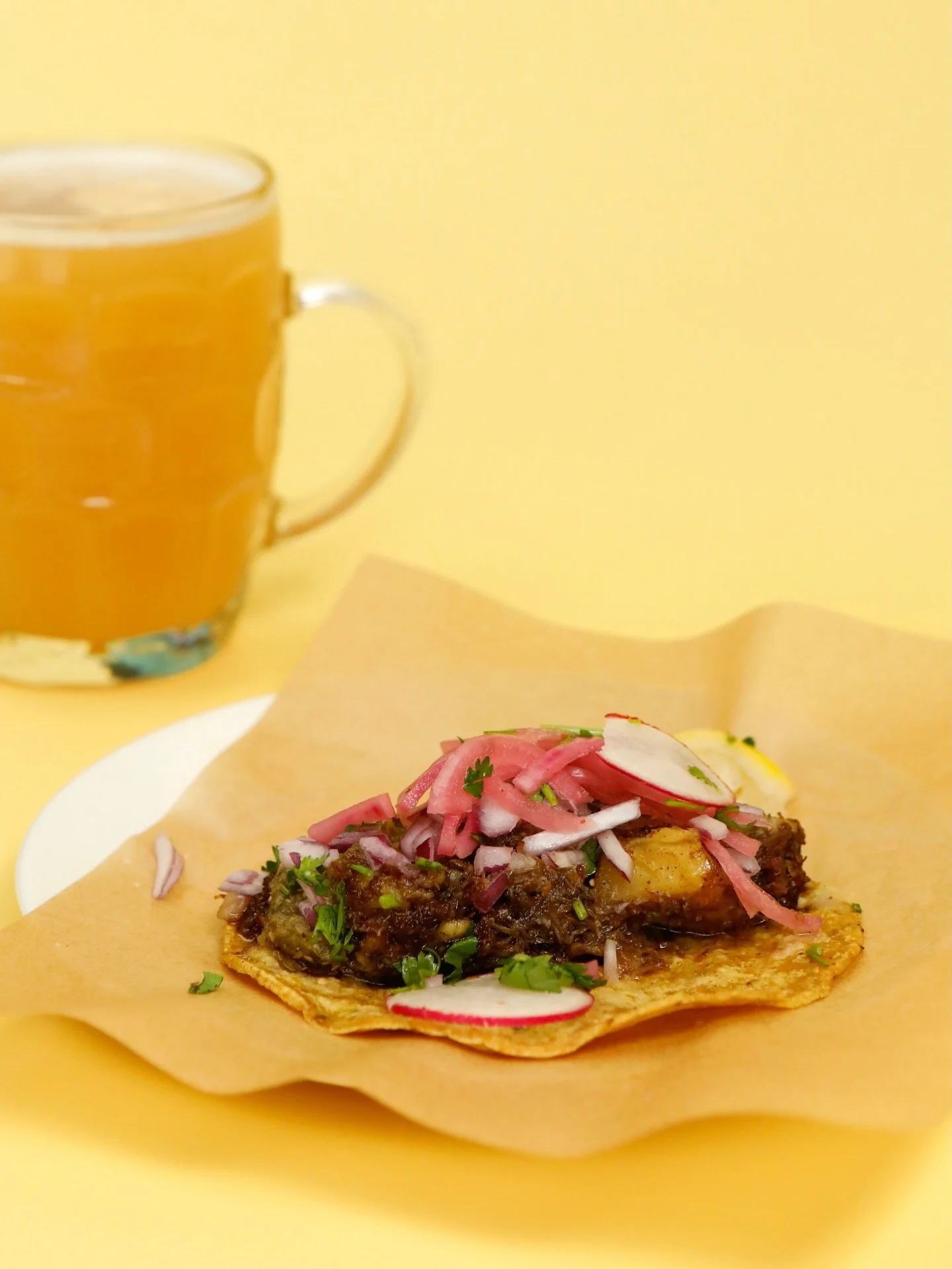 The weather might not be slapping but our menu is. Our beef taco and a brew is the cure to any rainy day blues. Get it in ya. Open til late 🍻