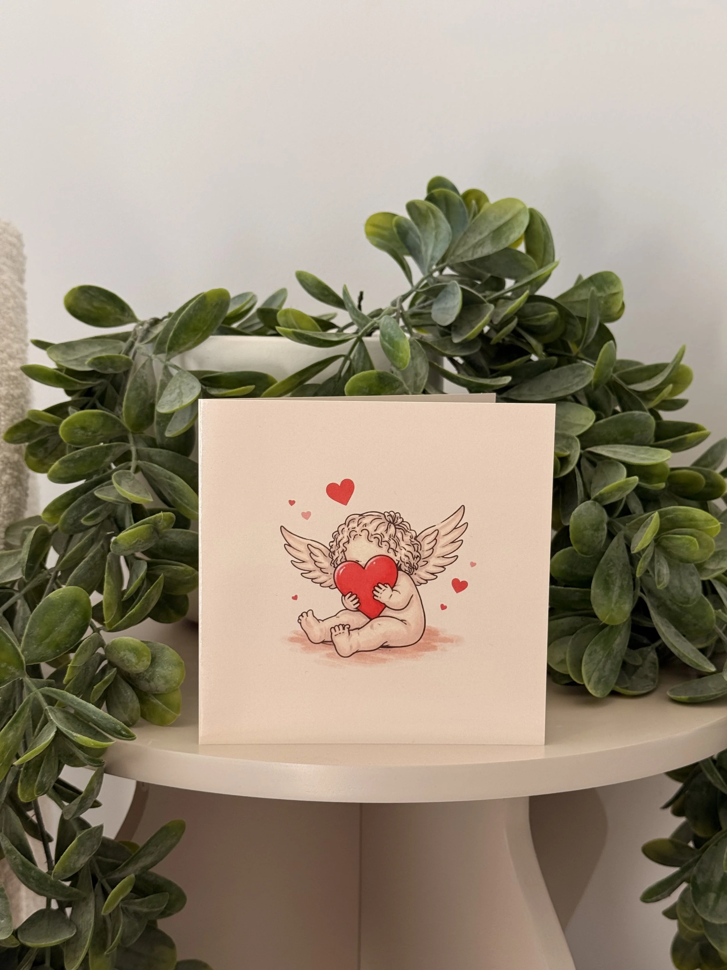 Cupid Has Good Taste - Greeting Card