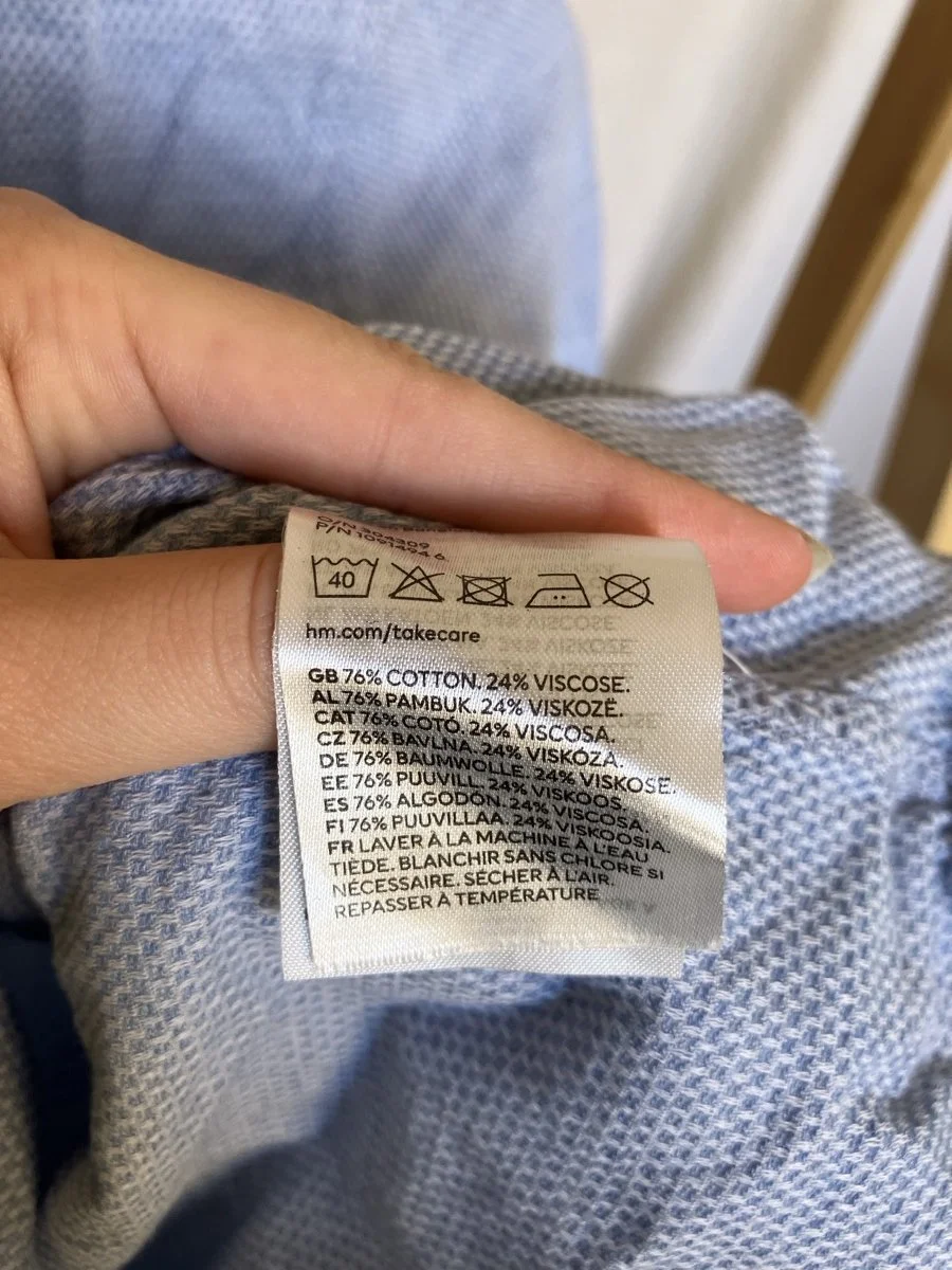 H%26M%20long%20sleeve%20blue%20button%20up%20fabric%20tag.jpg