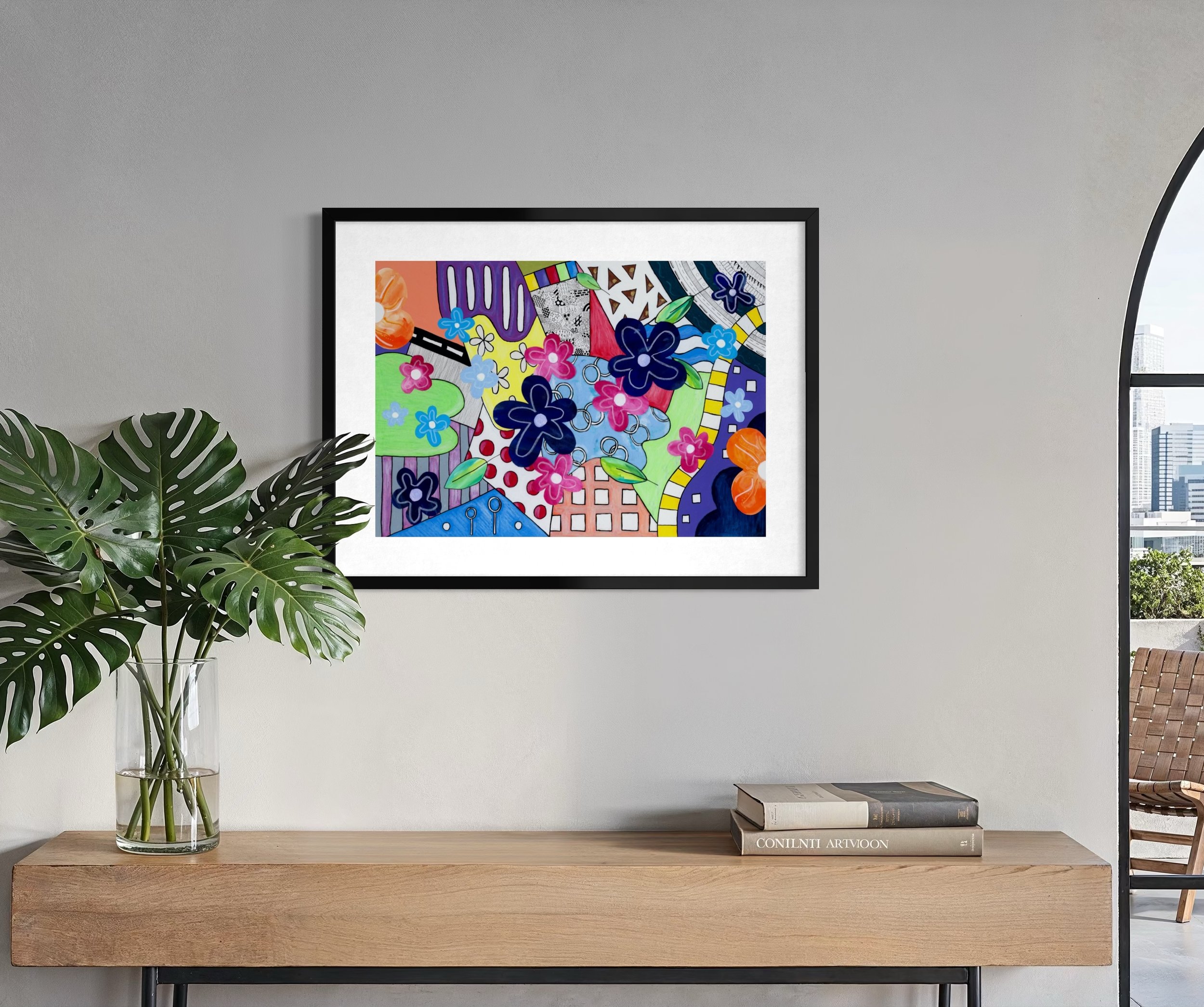 Spring Breeze Overland fine art print in a contemporary interior, featuring bold colour sections, collage flowers, a winding path, road-like form, and playful hand-drawn details.
