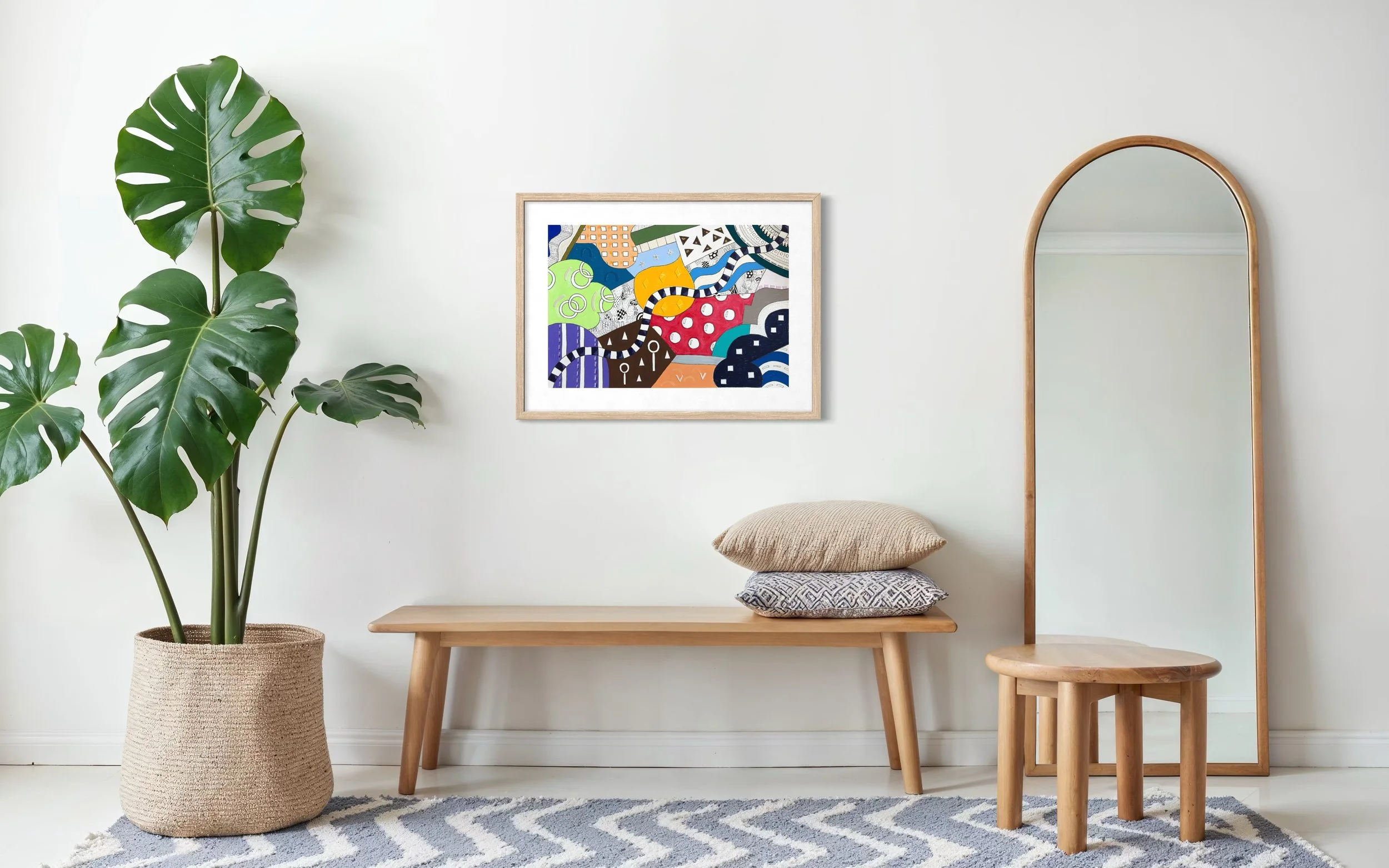 Invented Landscape, original mixed media on A2 paper with blocks of colour, collage, pattern, and hand-drawn marks, styled in a modern interior.