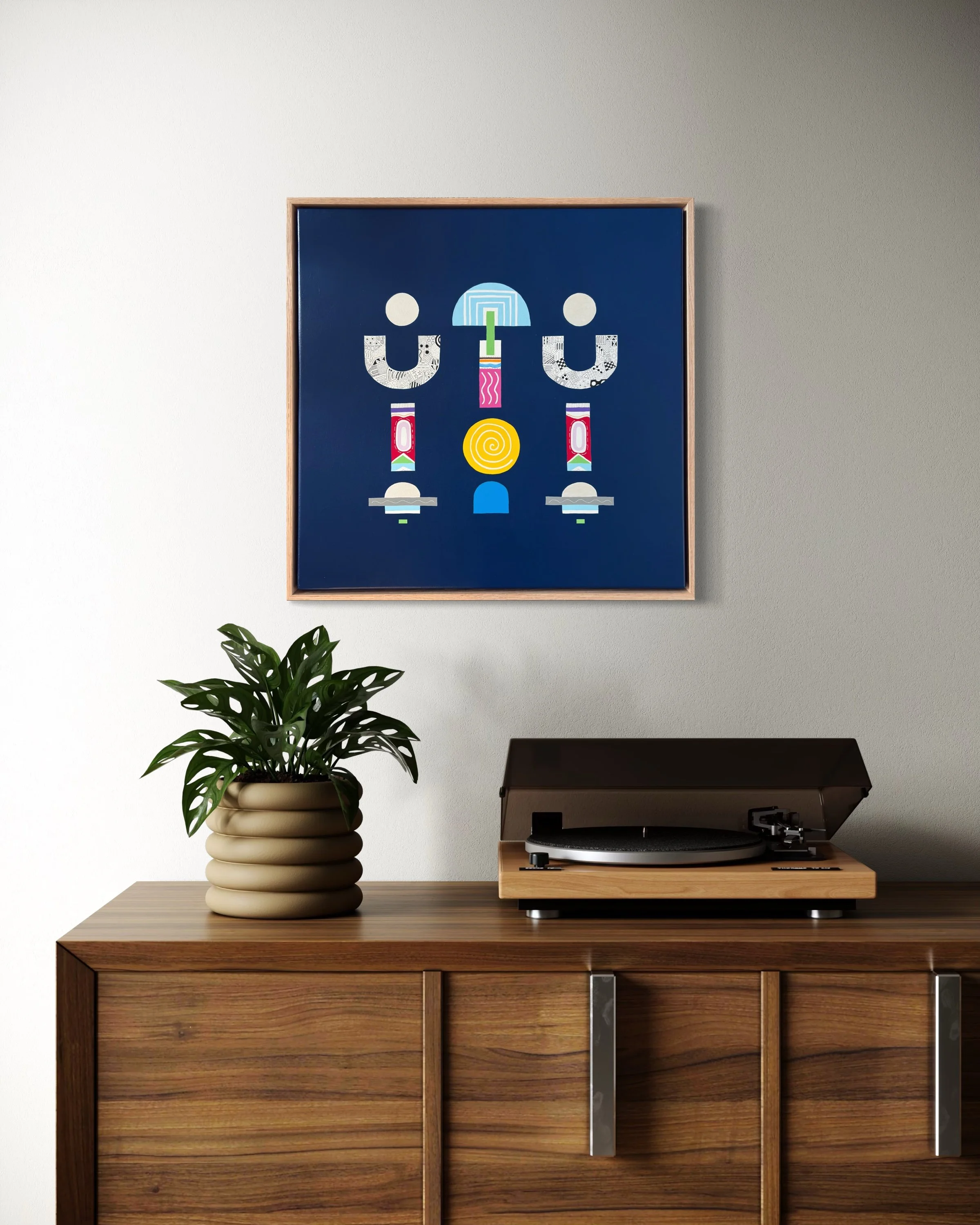 Upward Turn, original abstract artwork on canvas, geometric forms on a blue background, displayed above a table with home decor.