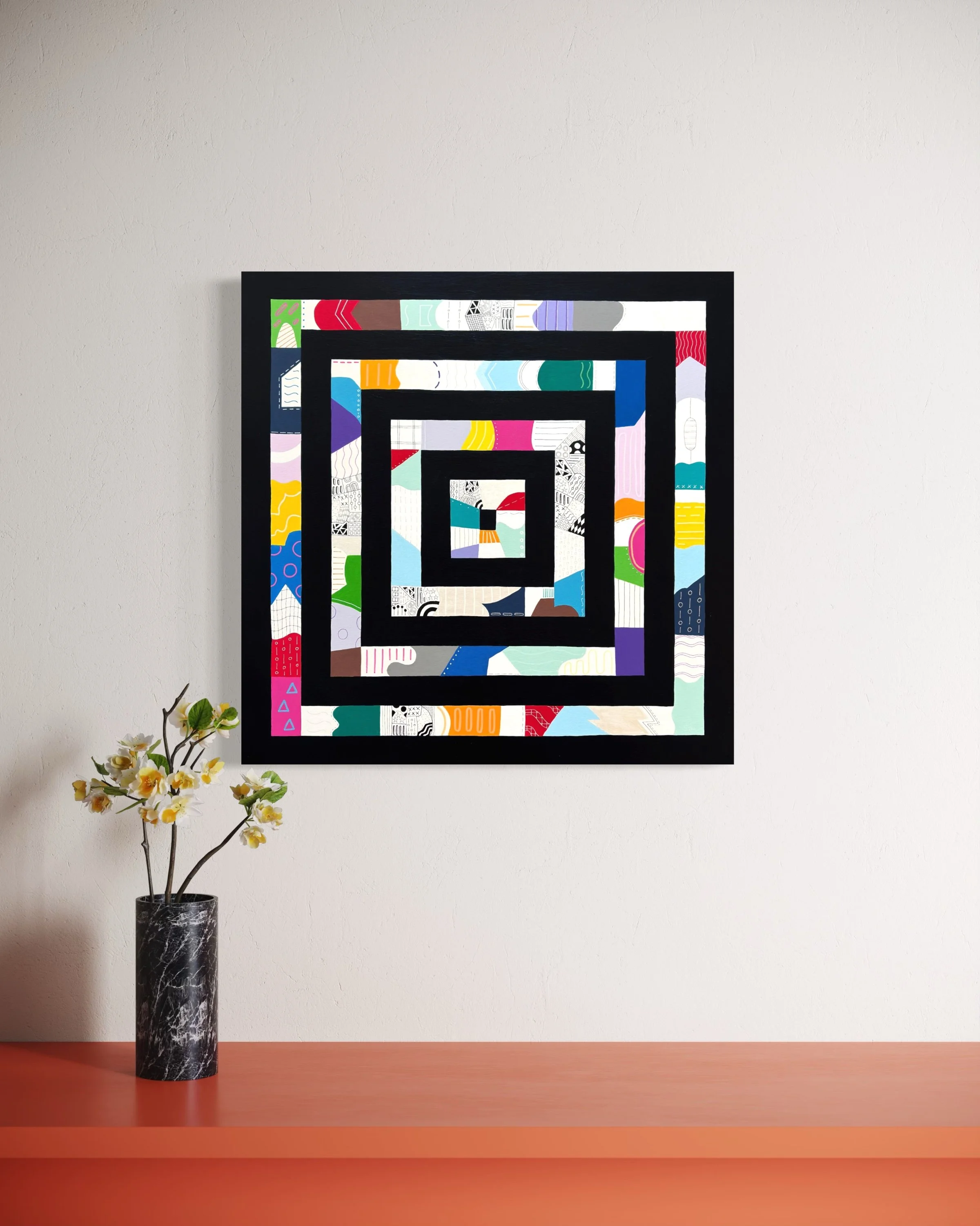 Freedom Within Boundaries, original abstract artwork on canvas featuring nested square frames in Paynes grey filled with bold, playful patterns and colour, styled in a modern interior.