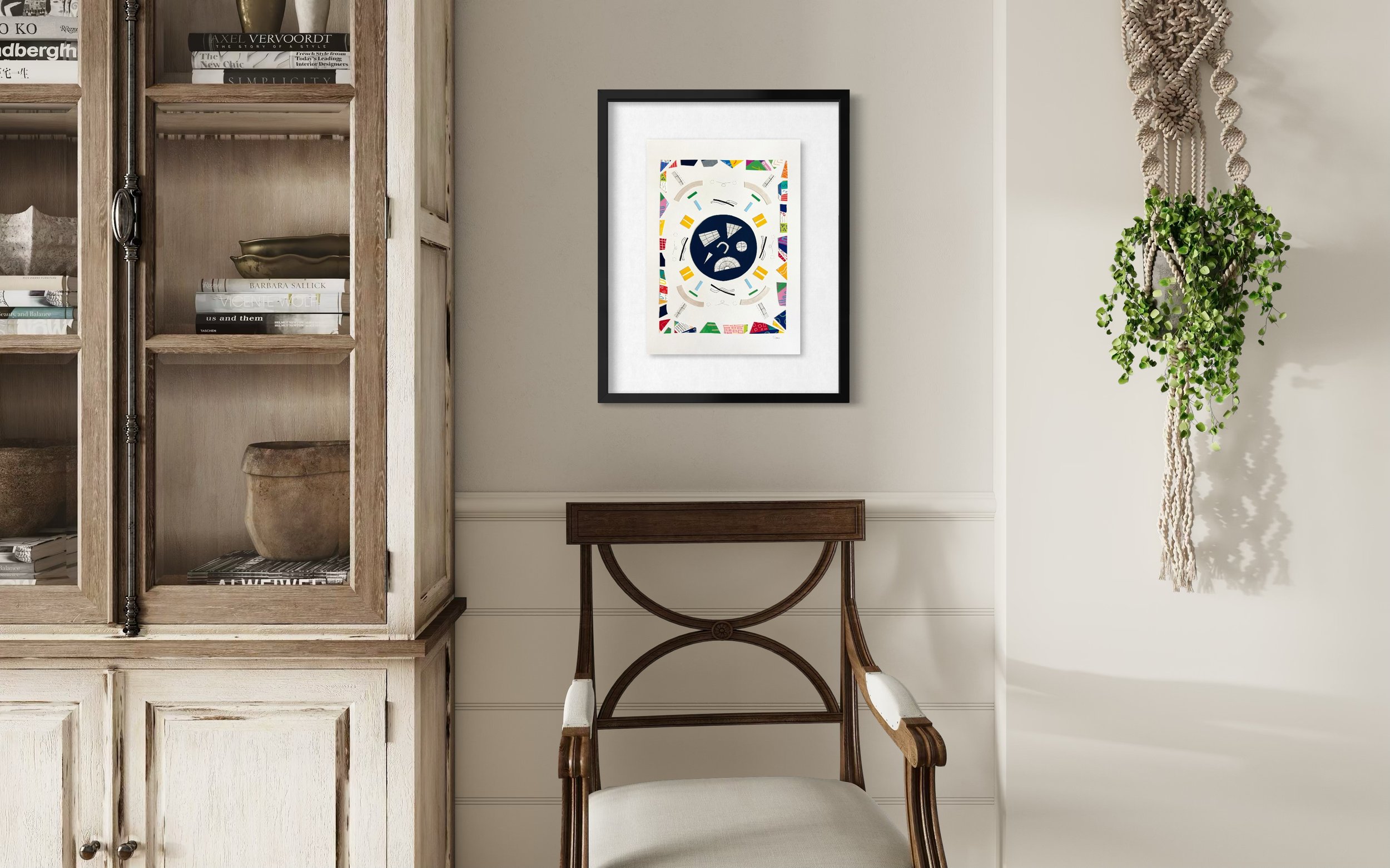A Measured Arrangement, A3 abstract mixed media collage with central pen drawings and painted fragments, framed by a border of acrylic marker and gel pen pieces framed and displayed above a chair.