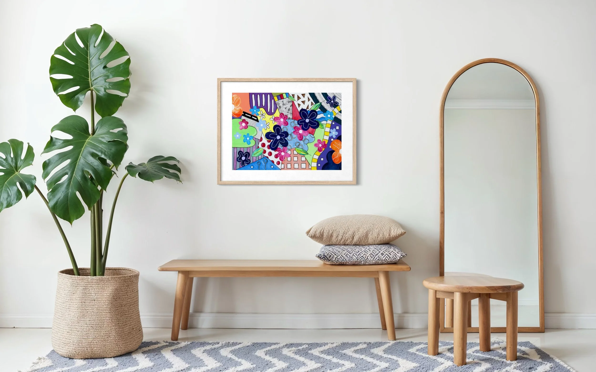 Spring Breeze Overland fine art print in a contemporary interior, featuring bold colour sections, collage flowers, a winding path, road-like form, and playful hand-drawn details.