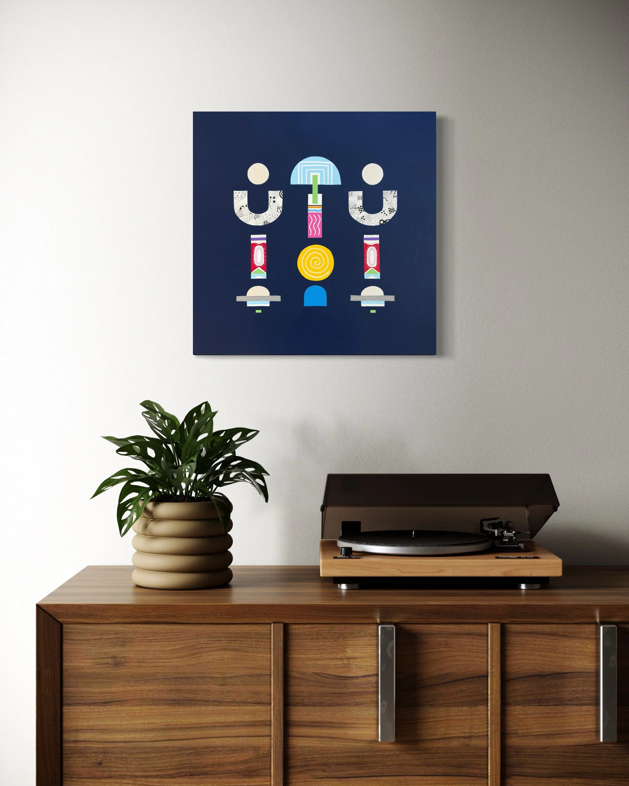 Upward Turn, original abstract artwork on canvas, geometric forms on a blue background, displayed above a table with home decor.