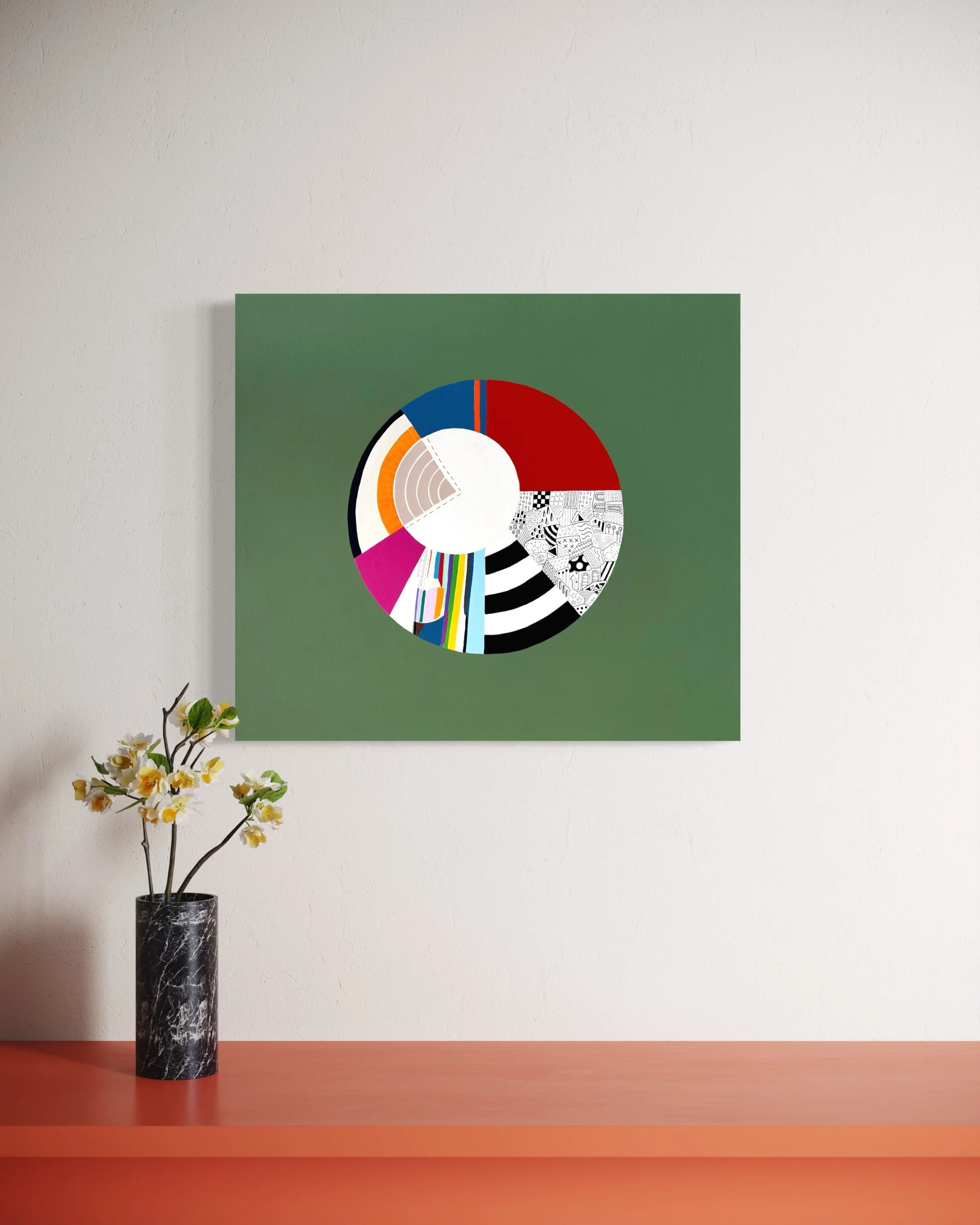 Off Centre, original abstract artwork on canvas with a colourful circular composition, radiating sections and an off-centre white circle on a jade green background, styled in a modern interior.