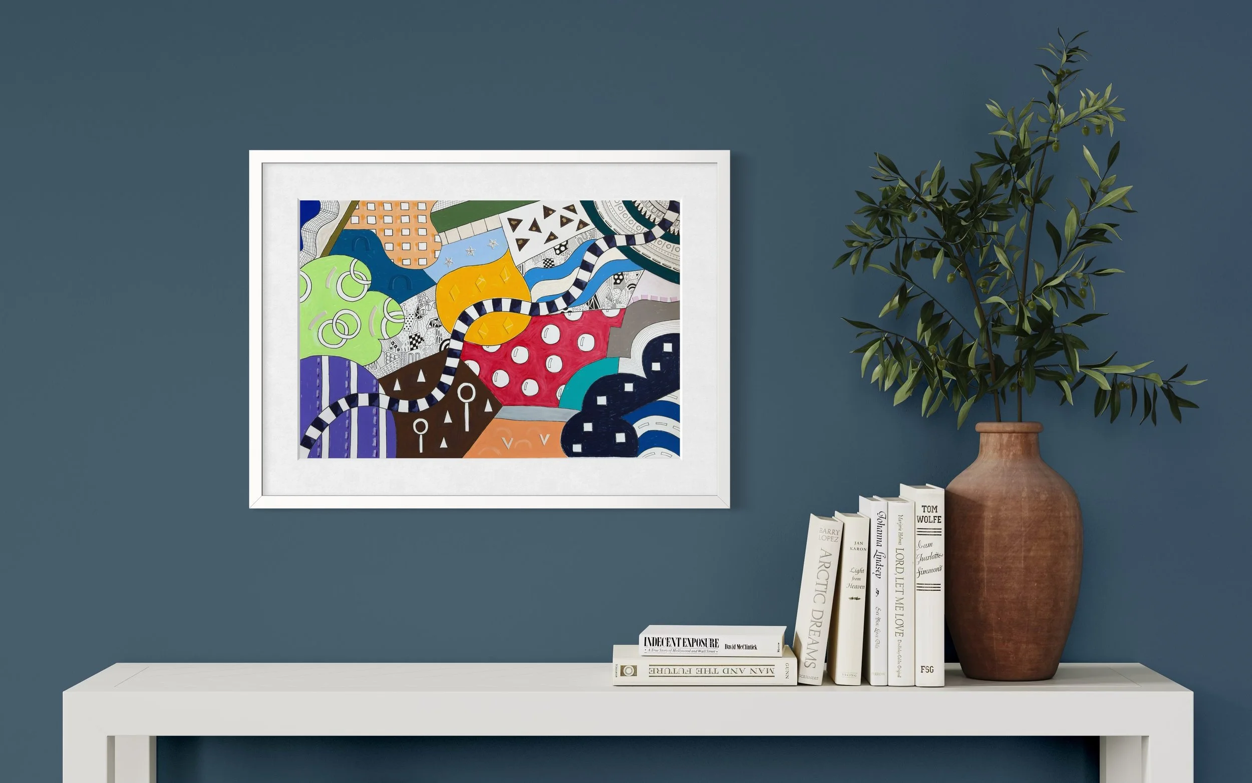 Invented Landscape, original mixed media on A2 paper with blocks of colour, collage, pattern, and hand-drawn marks, styled on a blue wall in a modern interior.
