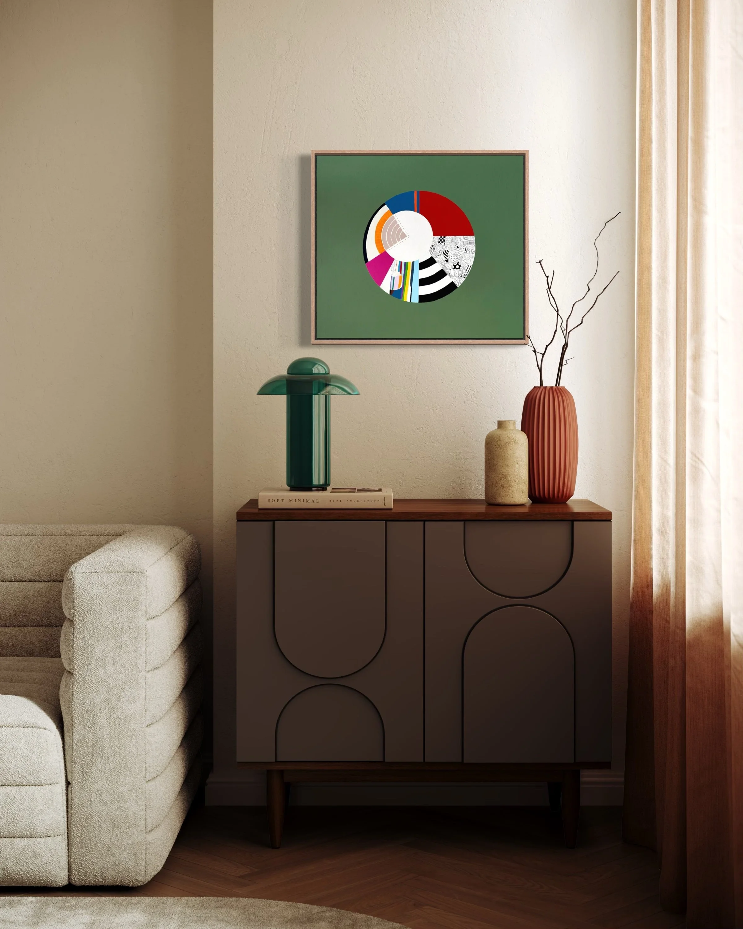 Off Centre, original abstract artwork on canvas with a colourful circular composition, radiating sections and an off-centre white circle on a jade green background, styled in a modern interior.