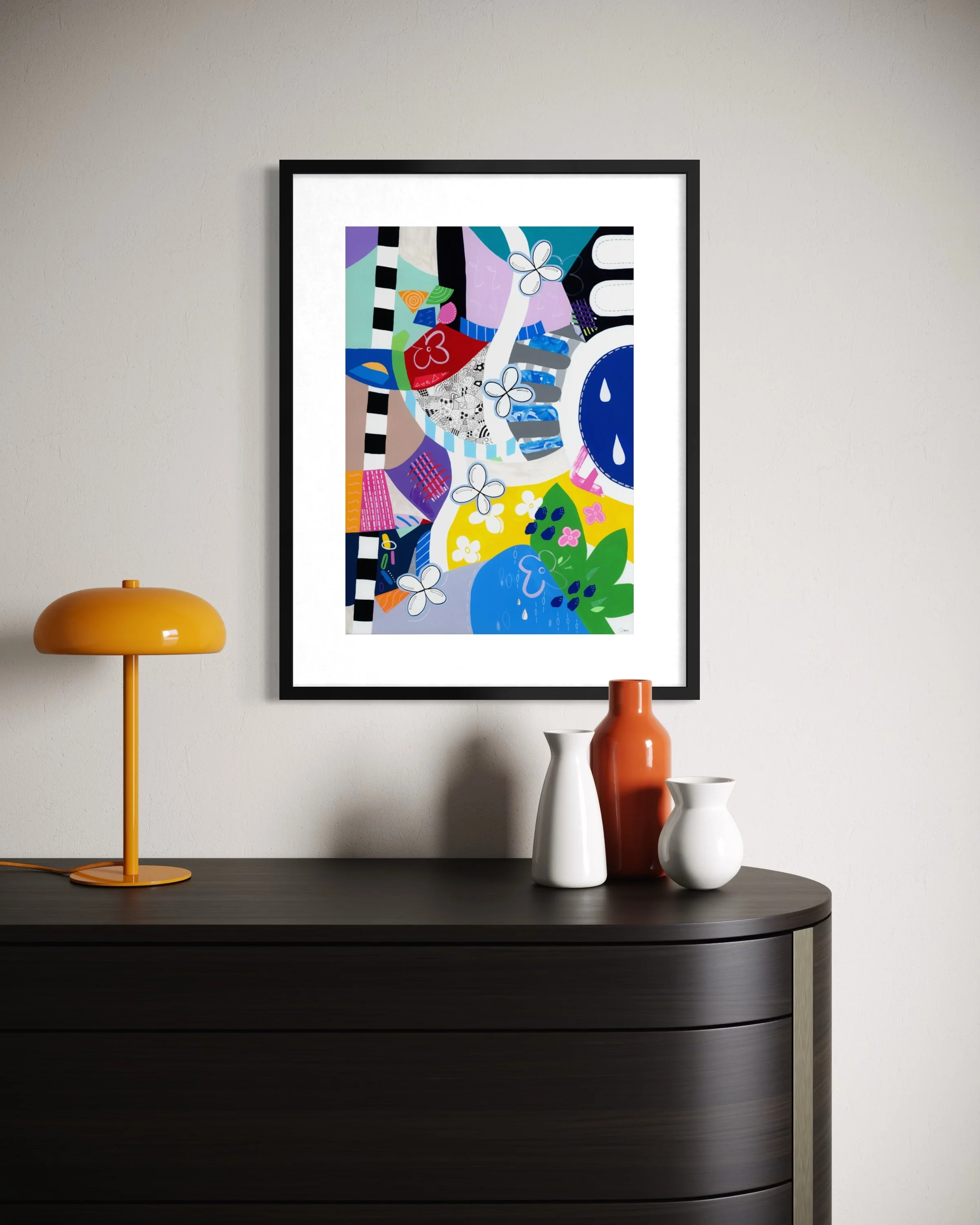 Crossing Currents fine art print displayed in a contemporary interior, showing a colourful abstract artwork with collage elements, patterned shapes, wave-like forms, flowers and organic details.