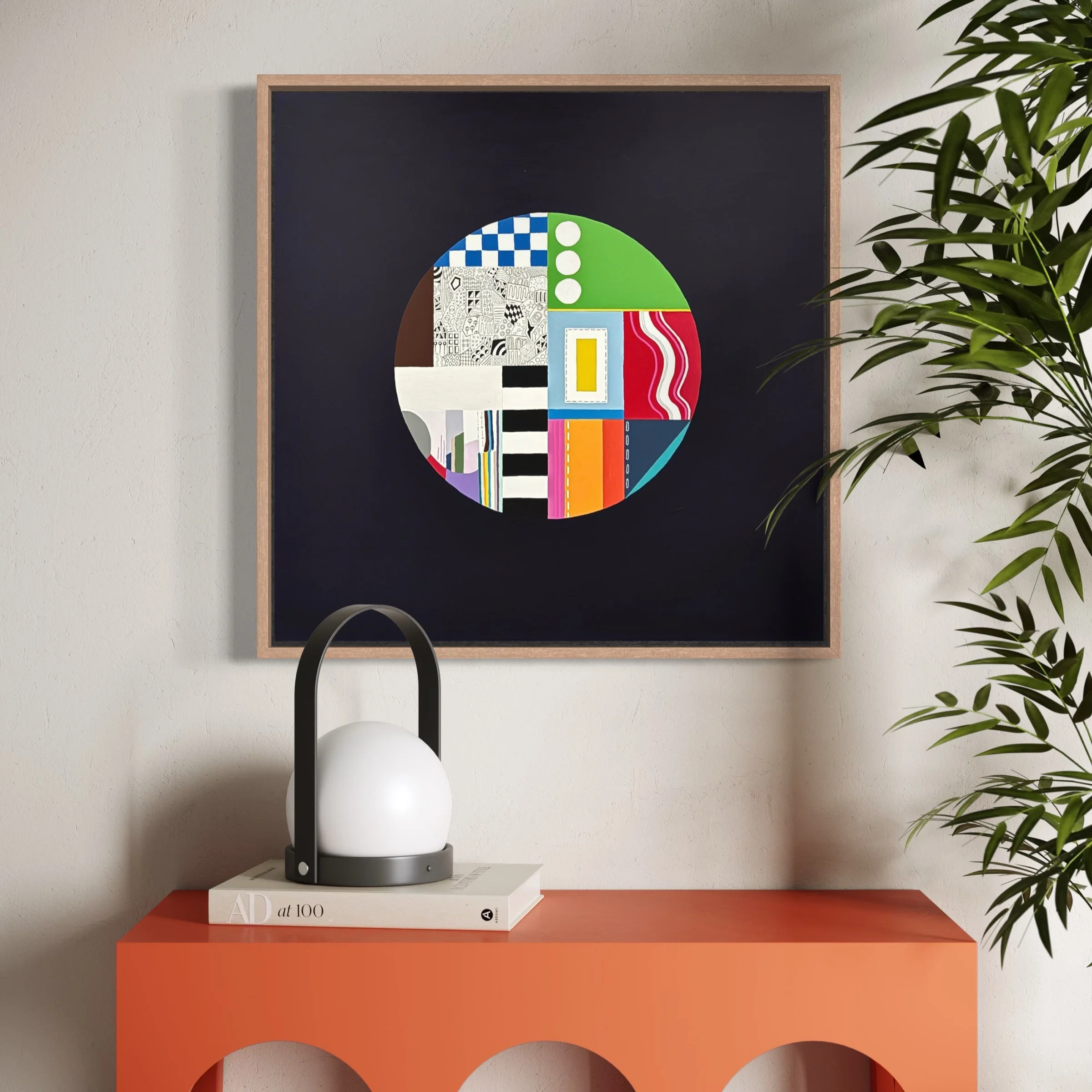 In a Roundabout Way, original mixed media abstract artwork featuring a circular composition, colour, patterns and geometric elements, displayed framed in a modern interior.