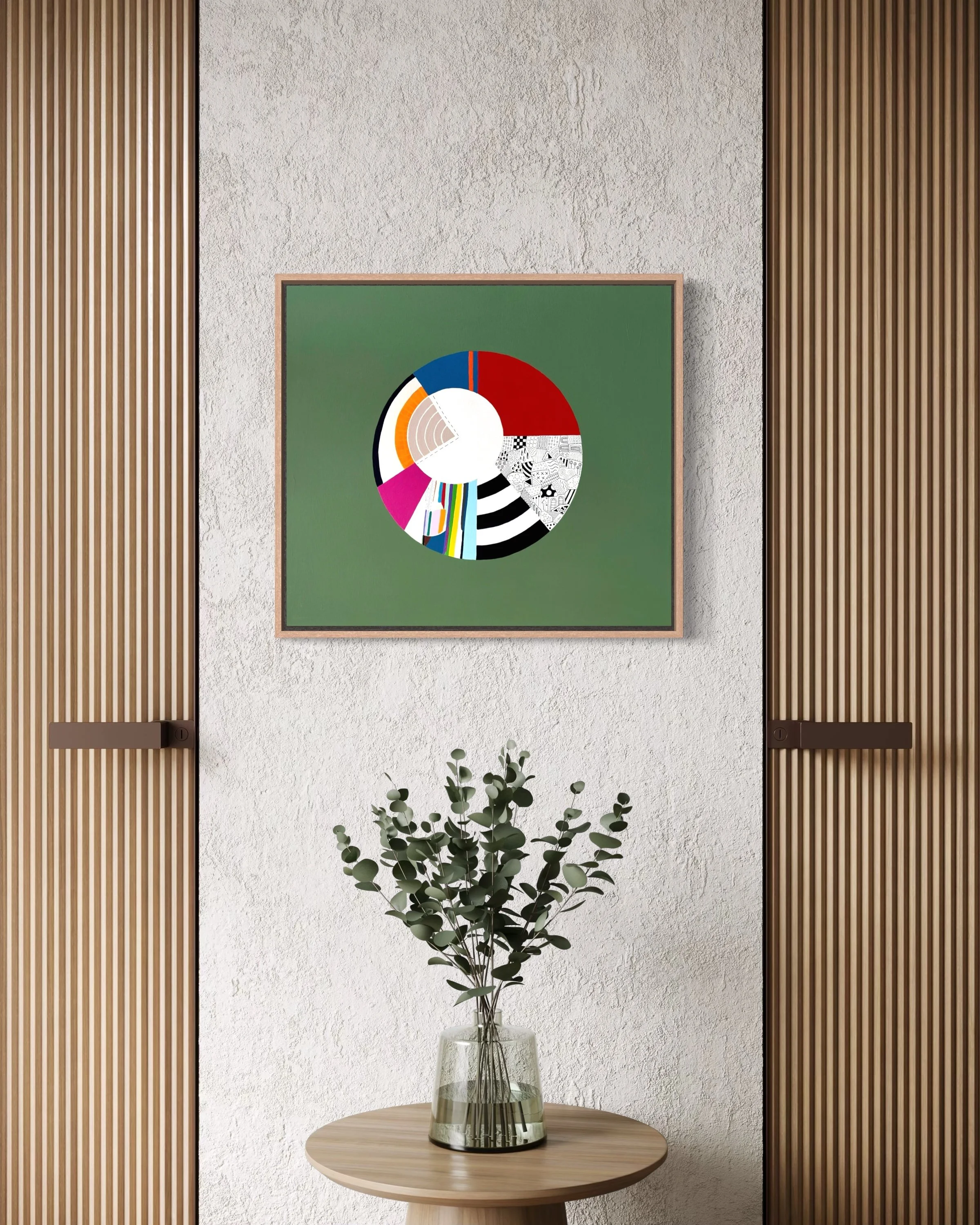 Off Centre, original abstract artwork on canvas with a colourful circular composition, radiating sections and an off-centre white circle on a jade green background, styled in a modern interior.