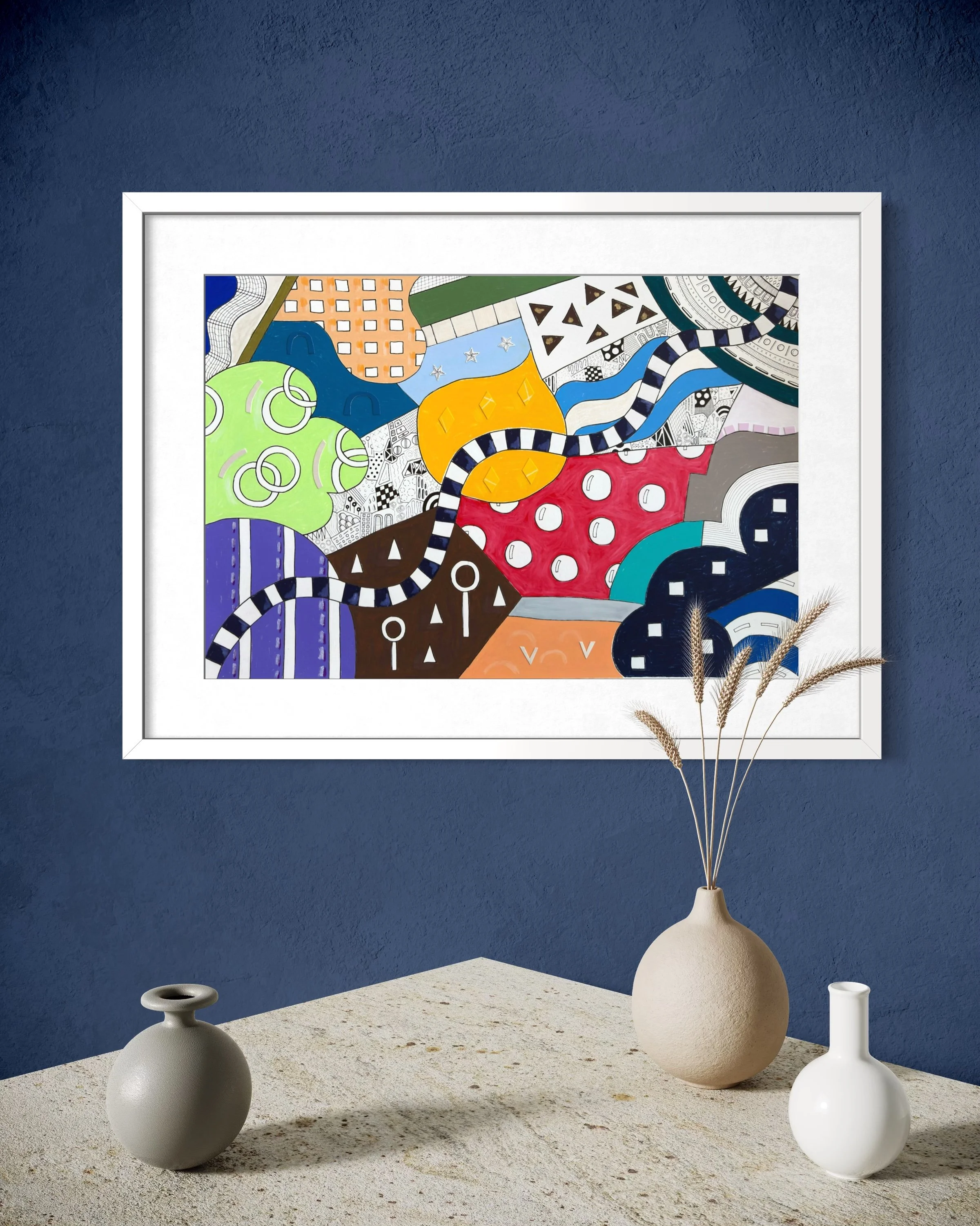 Invented Landscape, original mixed media on A2 paper with blocks of colour, collage, pattern, and hand-drawn marks, styled on a blue wall in a modern interior.