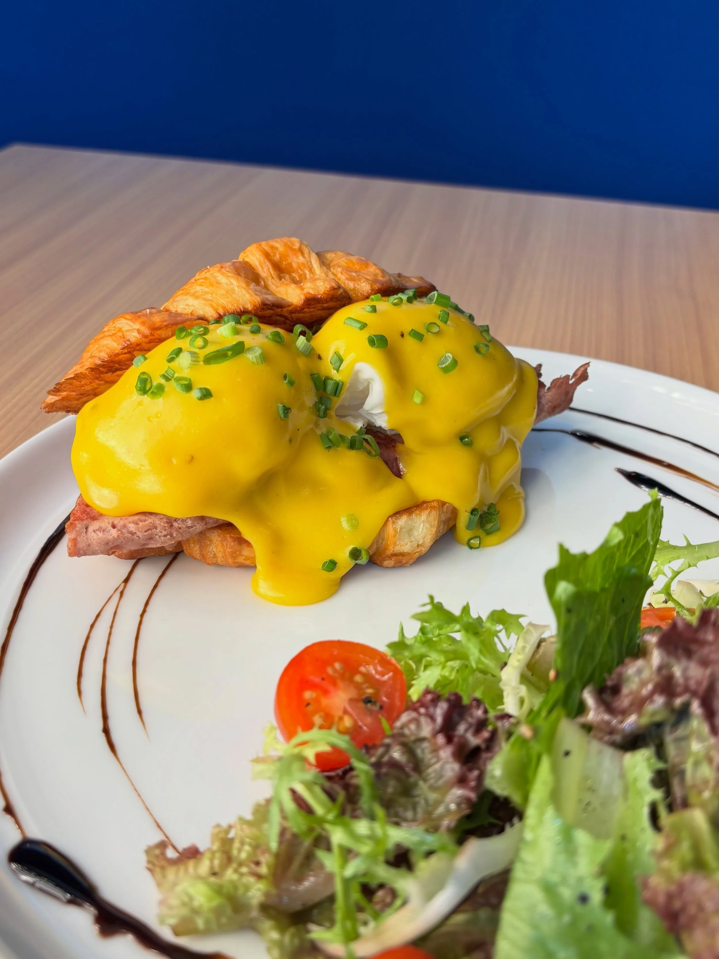 Looking for the best brunch in Ubud? 🥐🍳

Meet our new Croissant Egg Benny&mdash;a flaky buttery croissant topped with beef ham, perfectly poached free-range eggs, and our signature miso hollandaise. Served with a fresh salad and a drizzle of balsam