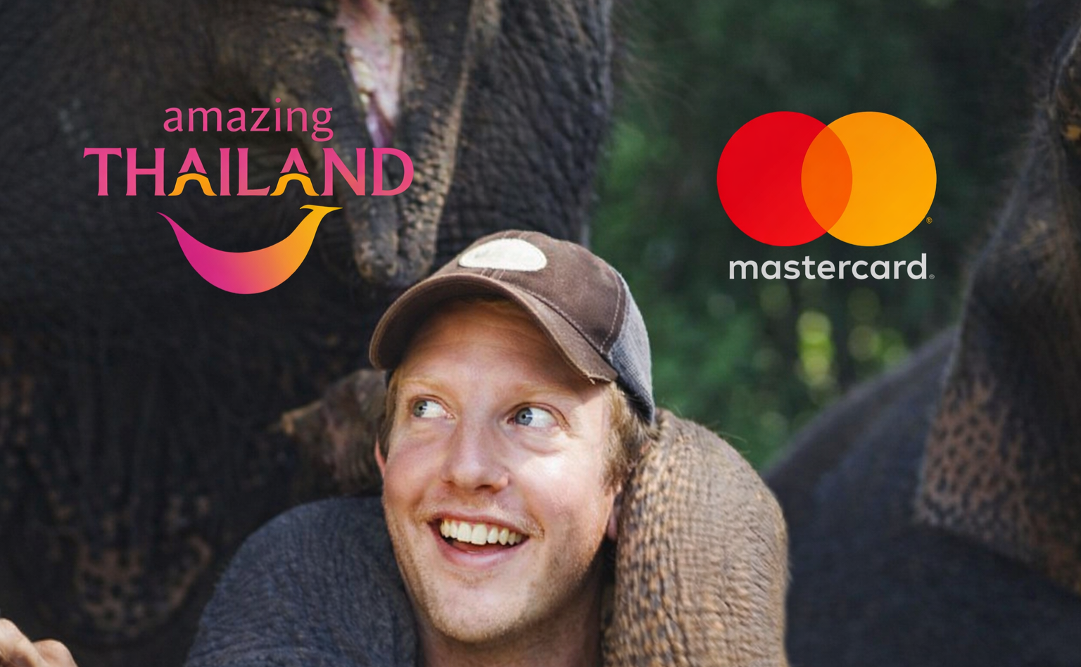 A smiling man wearing a hat, surrounded by elephants, with logos for Thailand tourism and Mastercard in the upper part of the image.