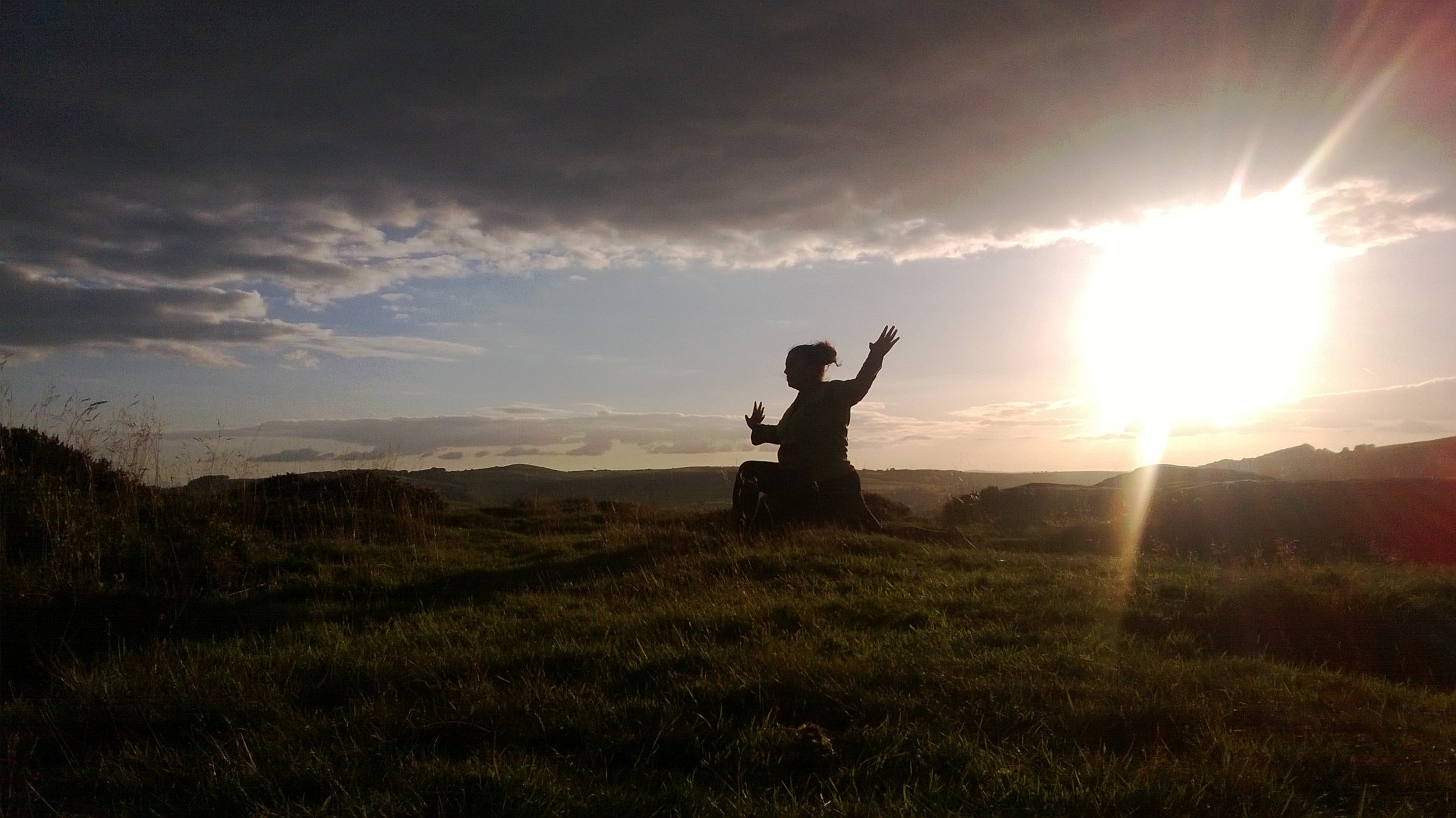 Jo doing her yoga on Froggatt edge