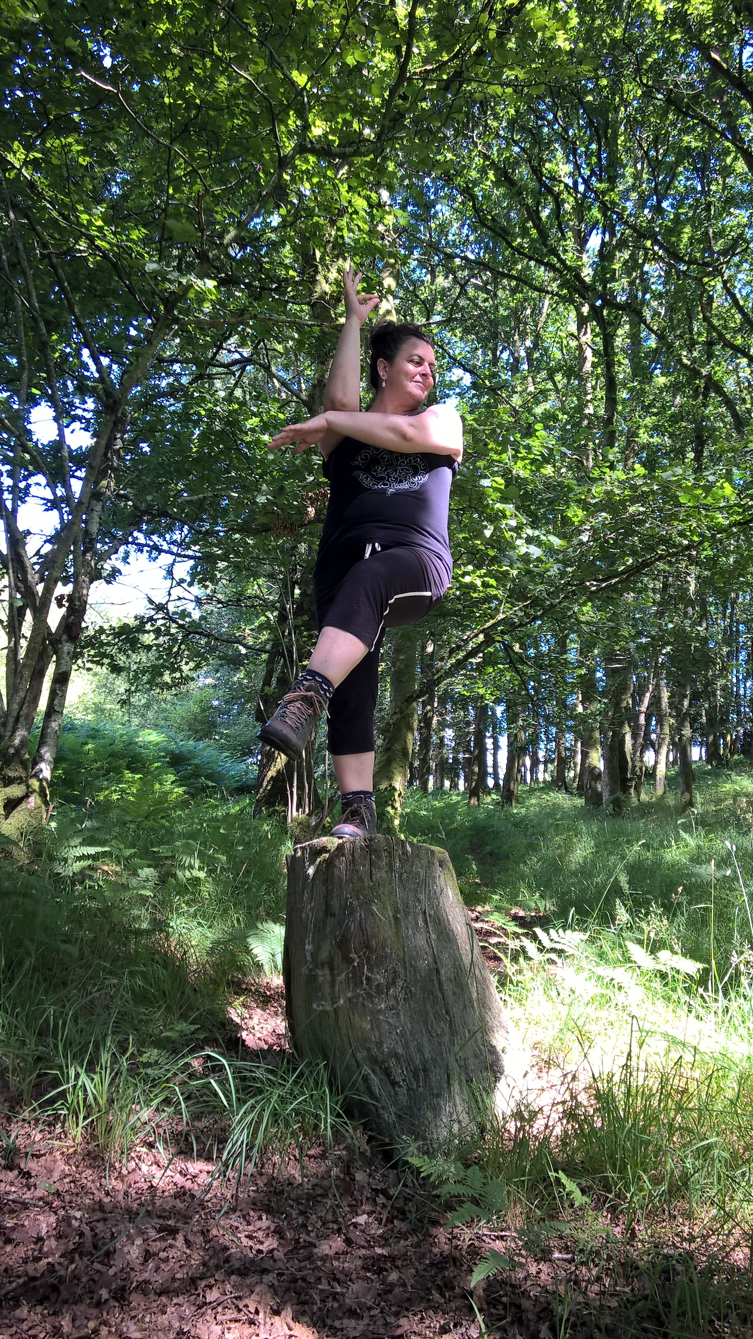 Jo on a tree stump, somewhere in Wales
