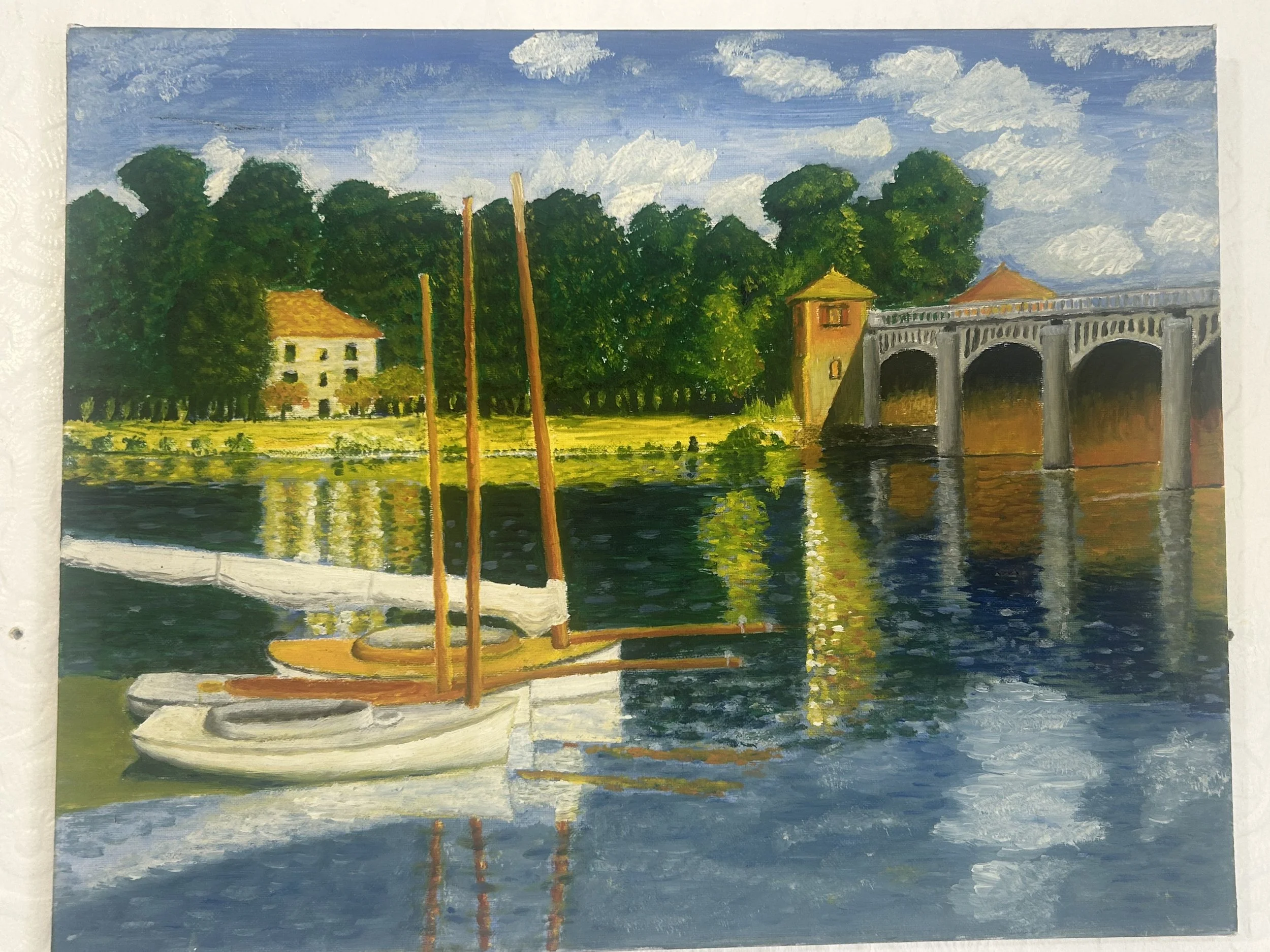 A painting depicting a lakeside scene with two small sailboats on the water, a bridge with arches, trees, and buildings in the background under a partly cloudy sky.