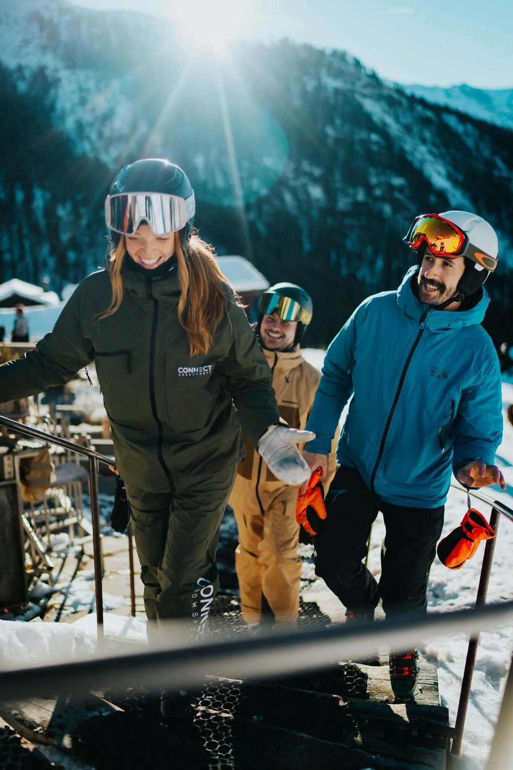 Ski instructor Claire leaves Chez Vrony with two clients after lunch during a private ski lesson 