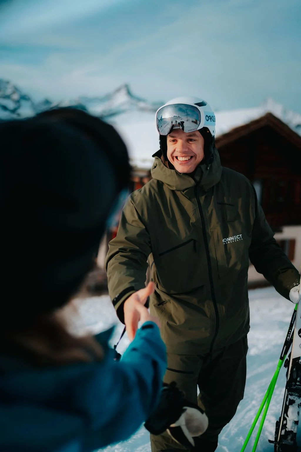 Ski instructor Steve greeting clients for the first time on the slopes of Zermatt